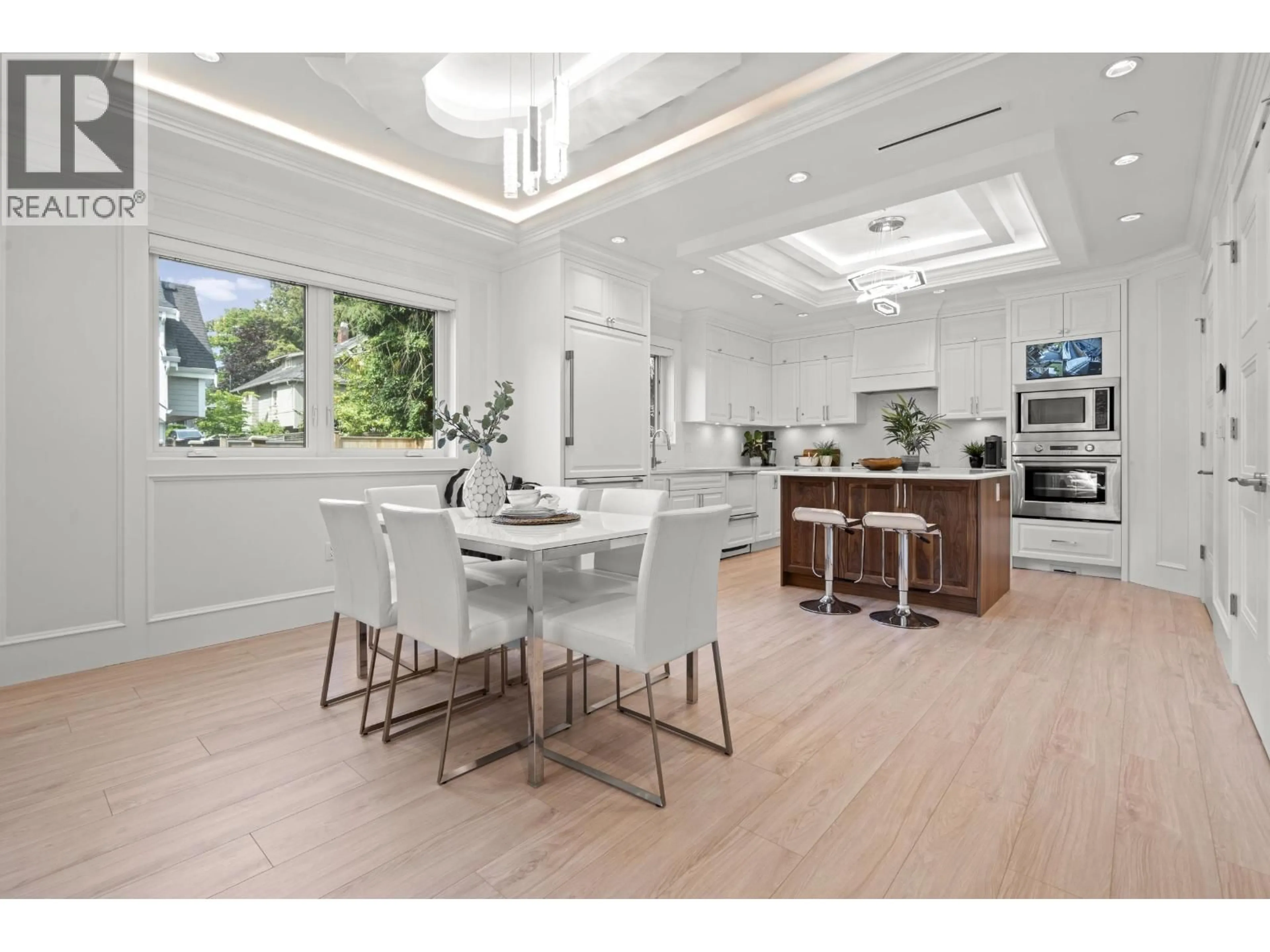 Open concept kitchen, wood/laminate floor for 2377 7TH AVENUE, Vancouver British Columbia V6K1Y4