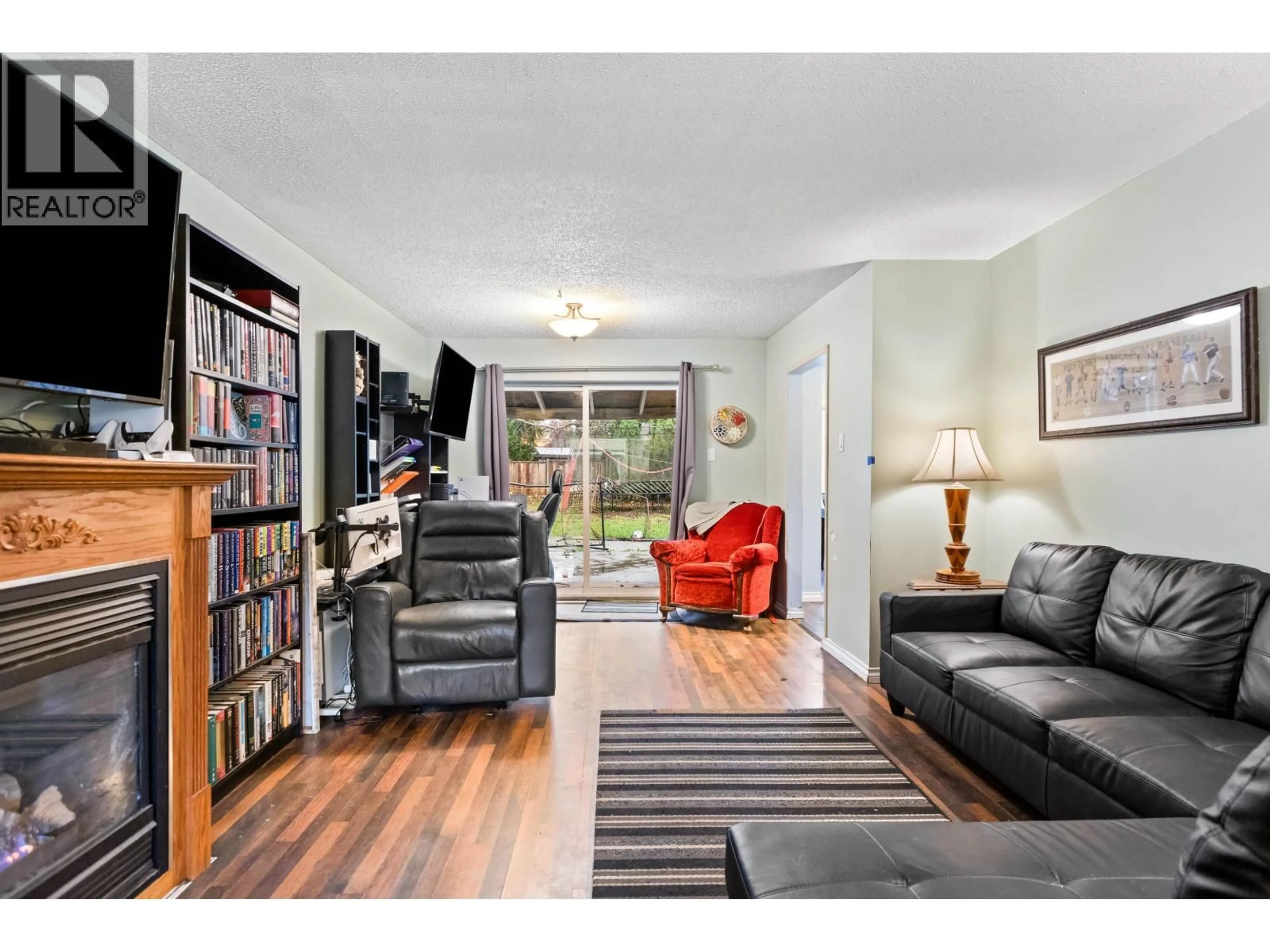 Living room with furniture, wood/laminate floor for 21127 WICKLUND AVENUE, Maple Ridge British Columbia V2X3S1