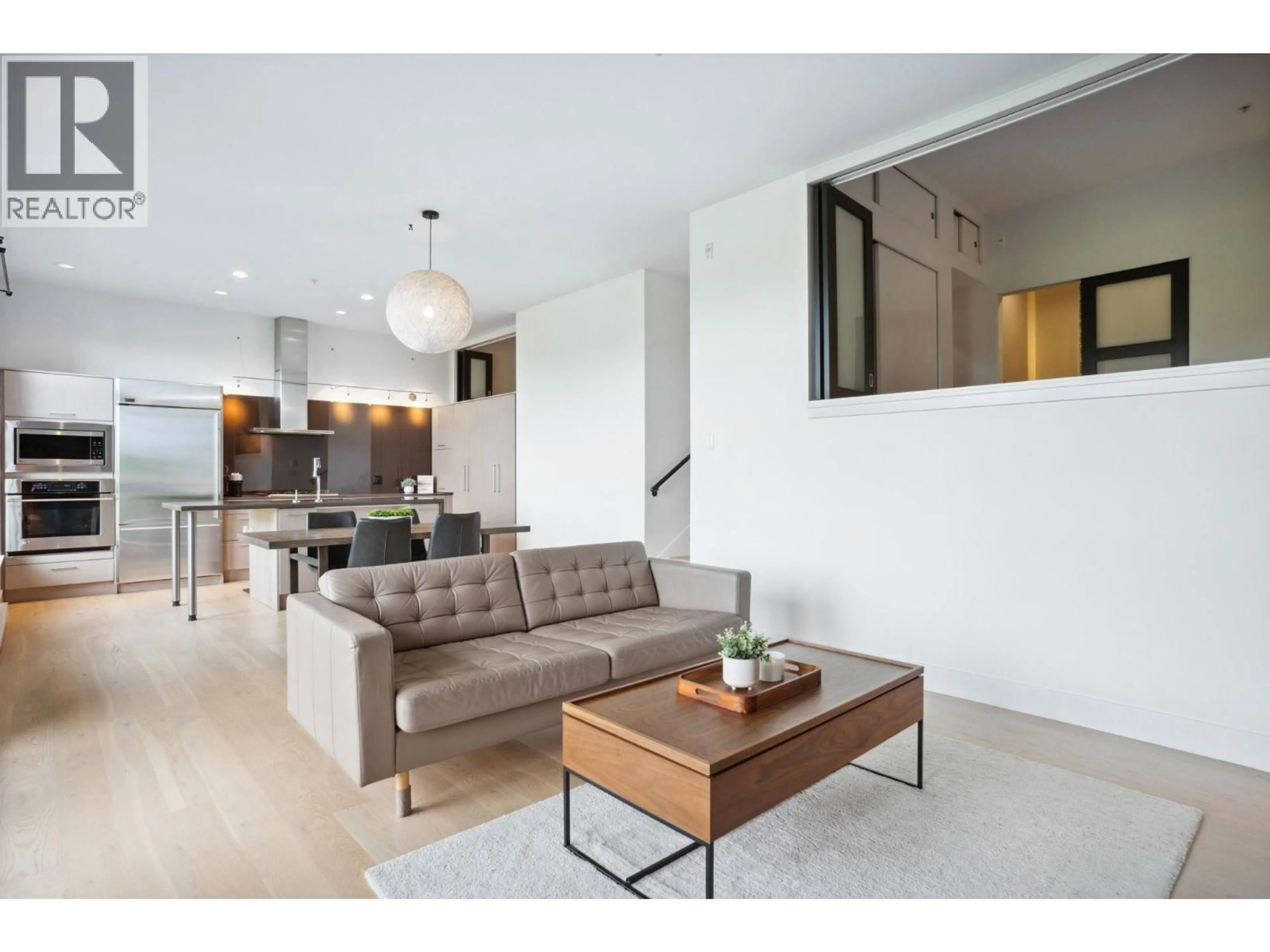 Living room with furniture, unknown for 302 - 220 SALTER STREET, New Westminster British Columbia V3M0H4