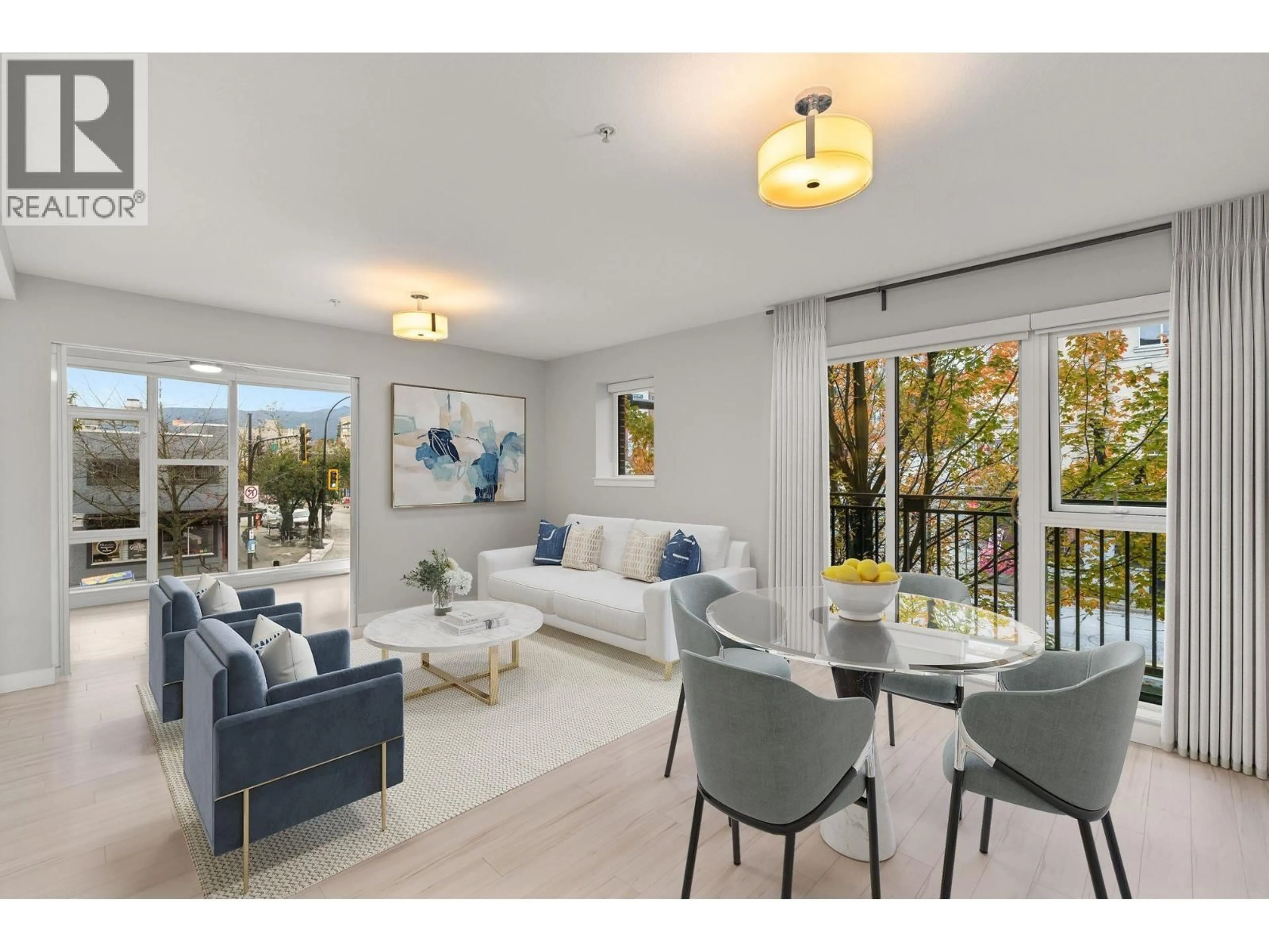 Living room with furniture, unknown for 207 - 111 3RD STREET, North Vancouver British Columbia V7L0C6