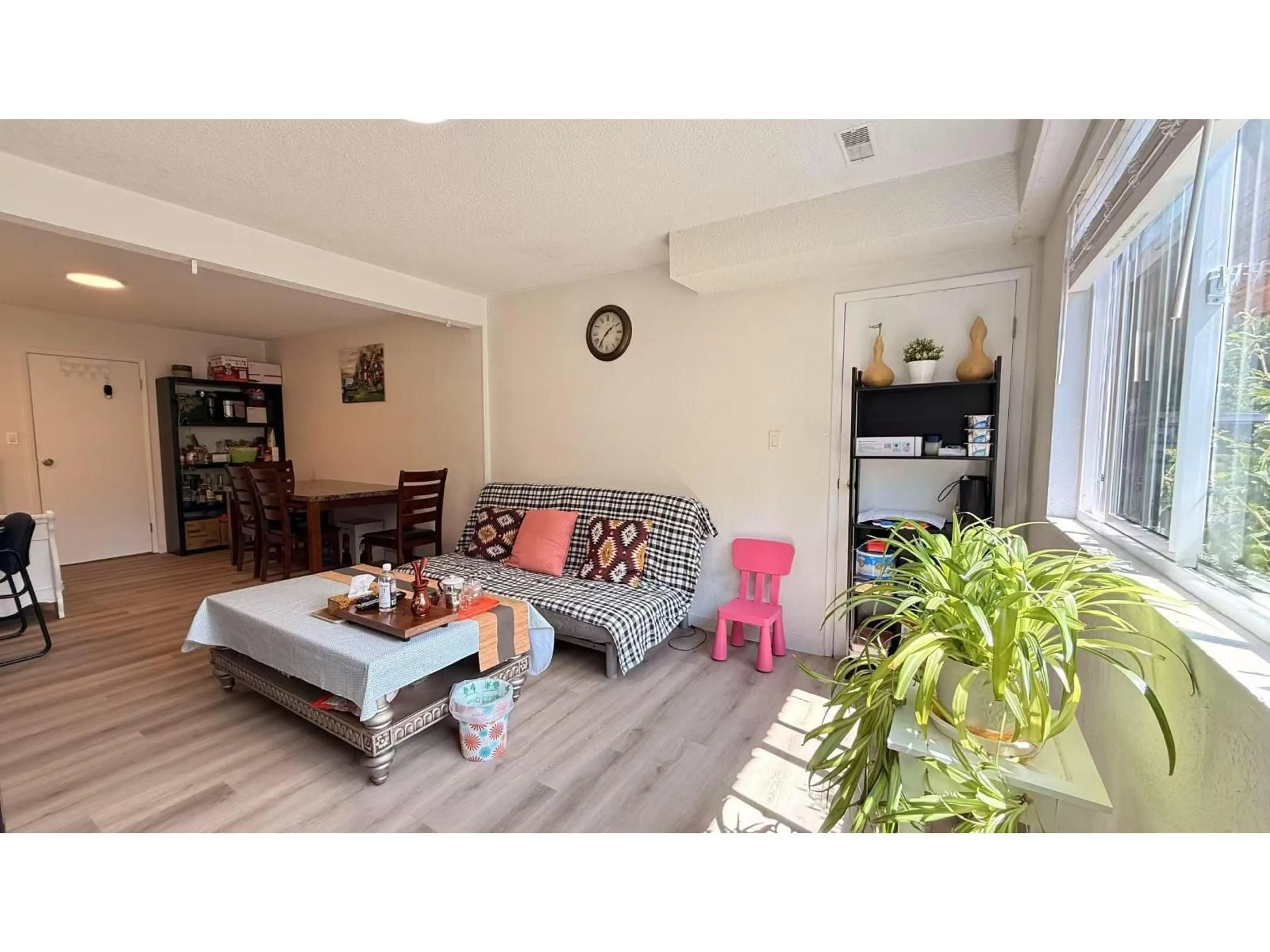 Living room with furniture, wood/laminate floor for 20763 39A AVENUE, Langley British Columbia V3A4Z3