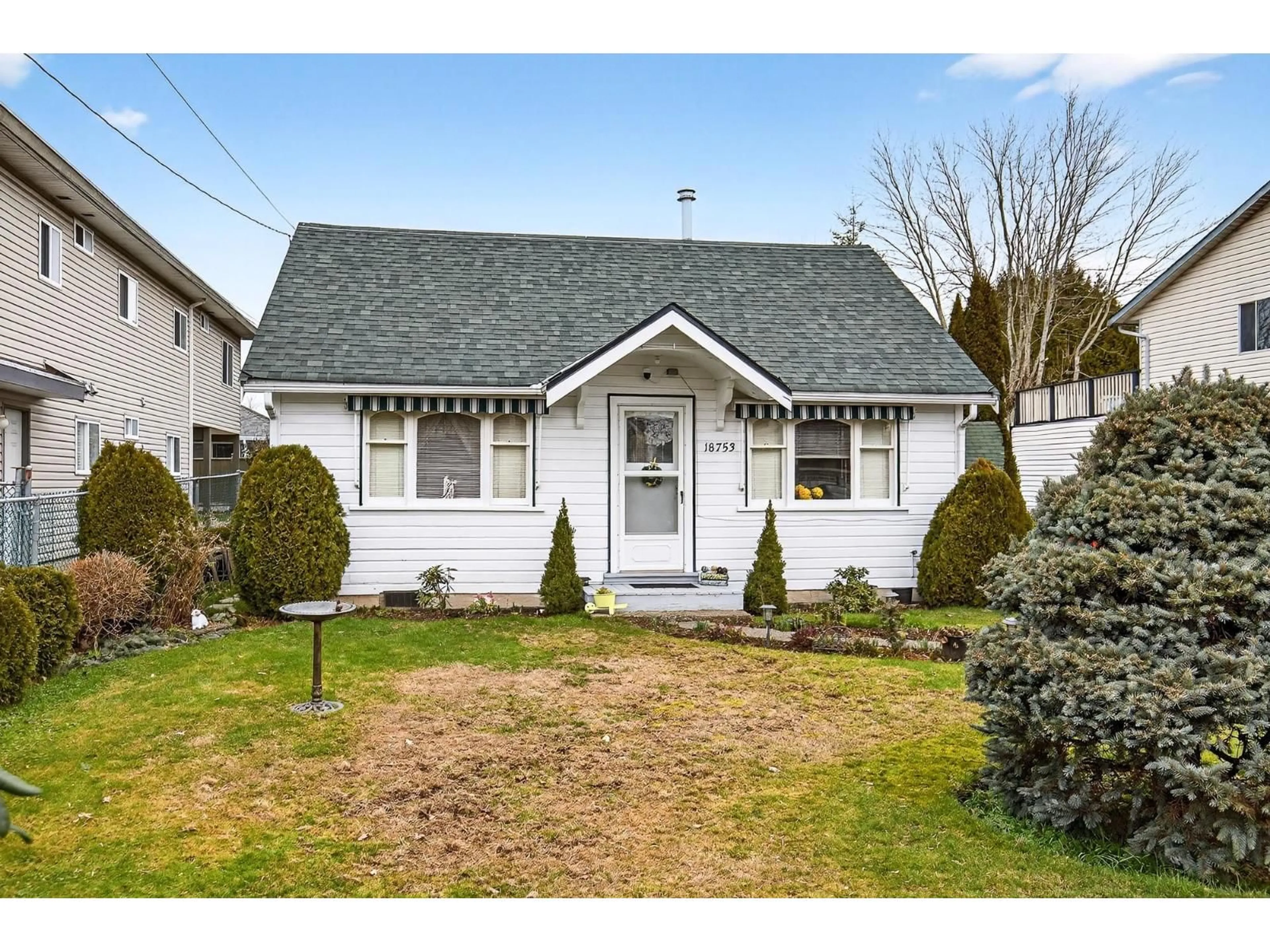 Home with vinyl exterior material, street for 18753 60 AVENUE, Surrey British Columbia V3S4N9