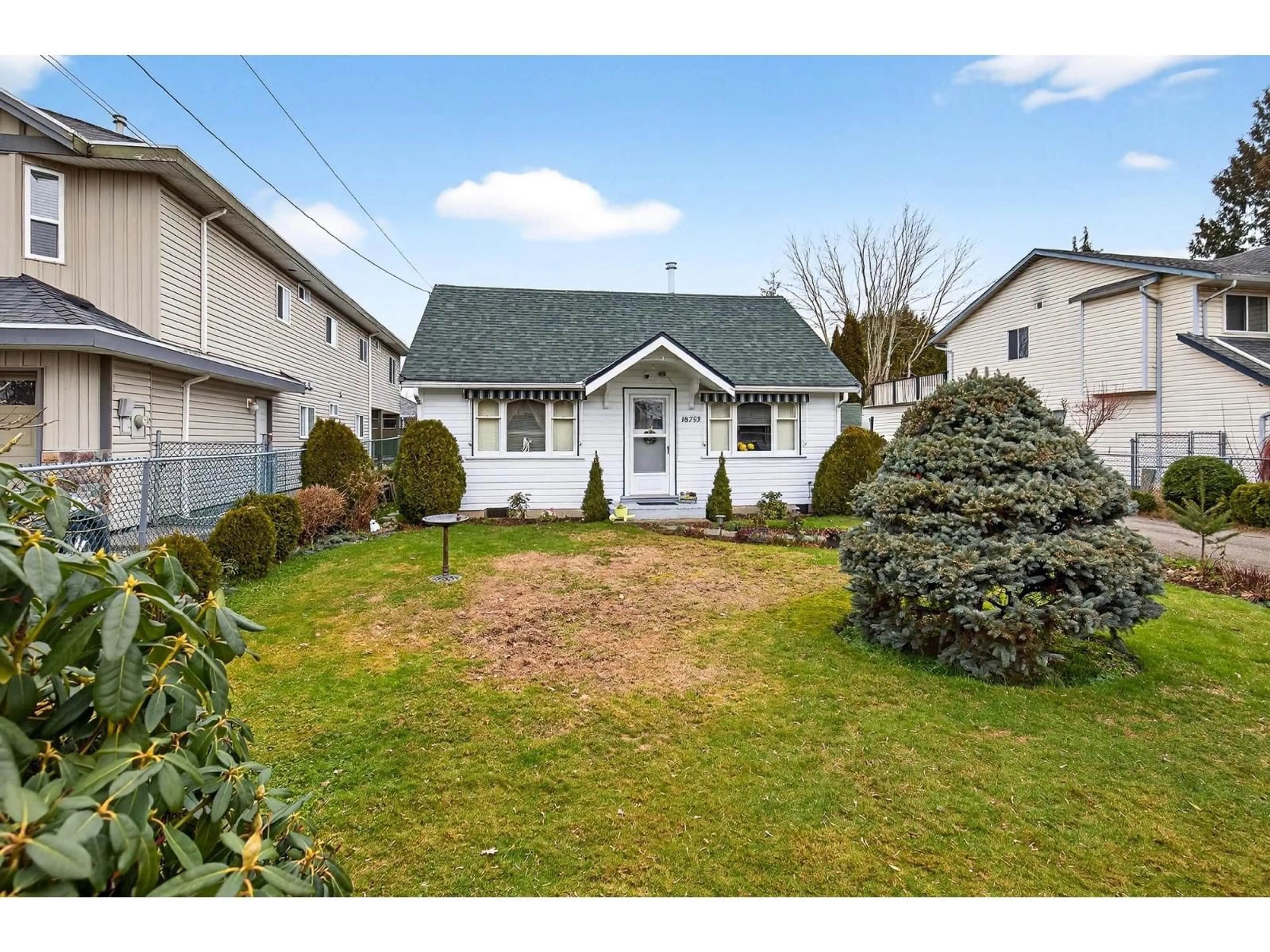 Home with vinyl exterior material, street for 18753 60 AVENUE, Surrey British Columbia V3S4N9