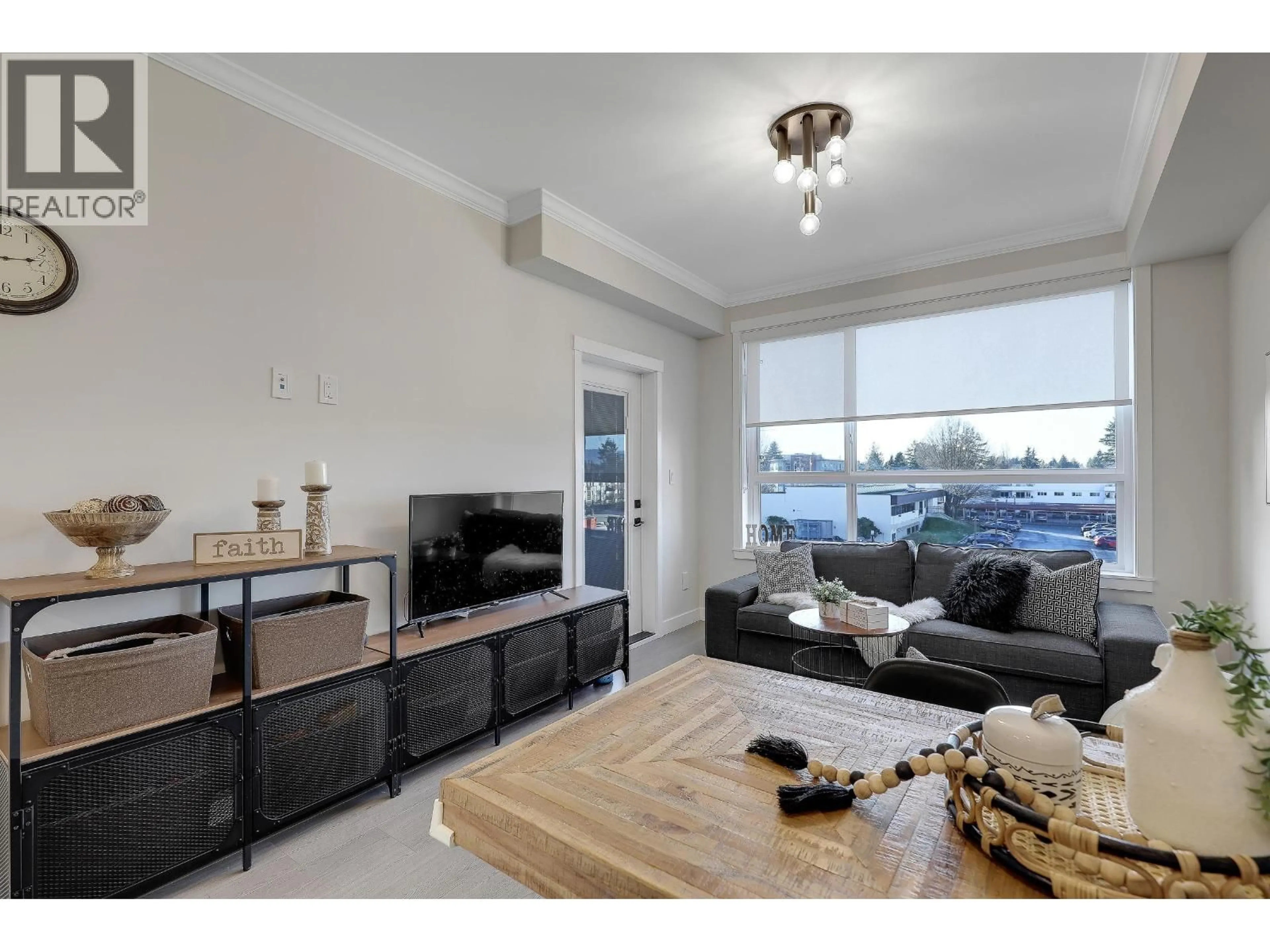 Living room with furniture, wood/laminate floor for 320 - 12109 223 STREET, Maple Ridge British Columbia V2X6X1