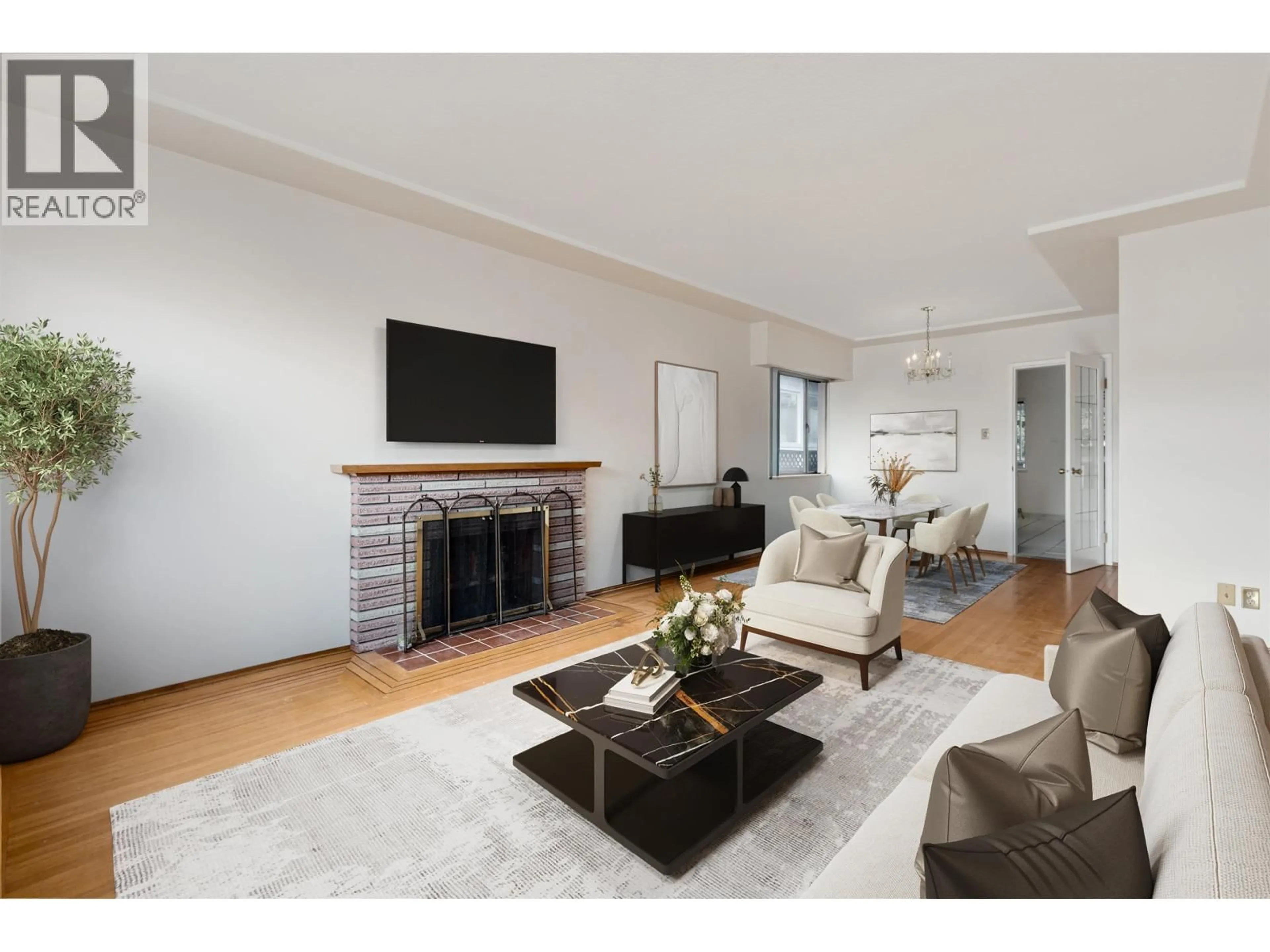 Living room with furniture, wood/laminate floor for 133 63RD AVENUE, Vancouver British Columbia V5X2H7