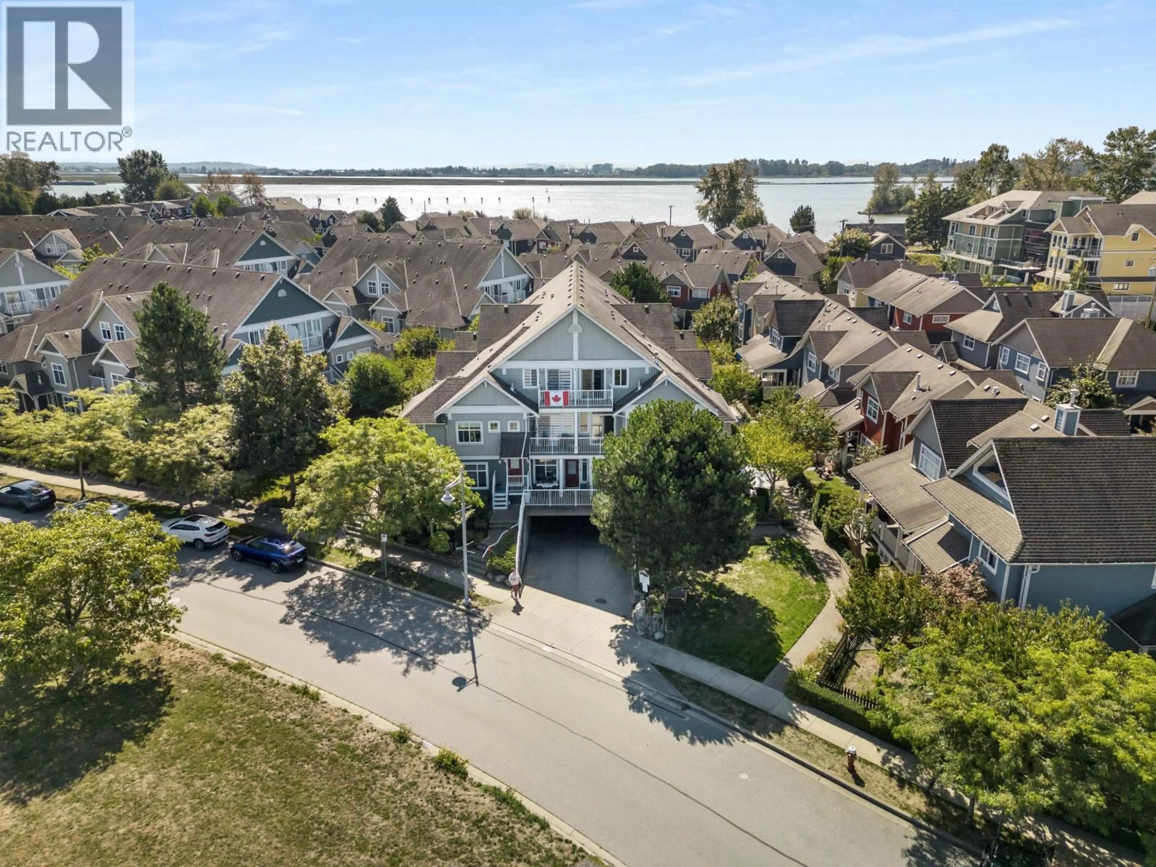 A pic from outside/outdoor area/front of a property/back of a property/a pic from drone, water/lake/river/ocean view for 24 - 6300 LONDON ROAD, Richmond British Columbia V7E6V6