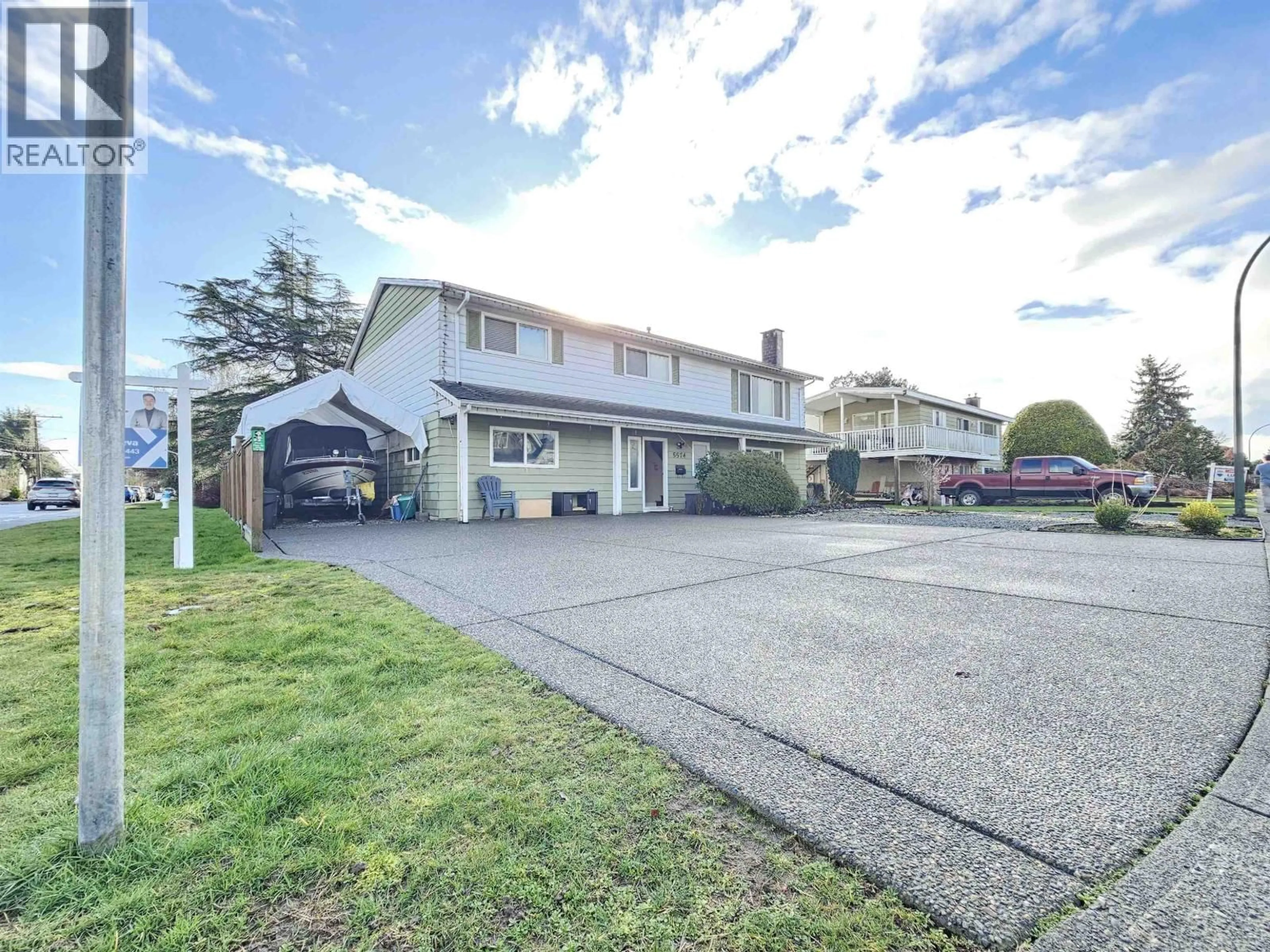A pic from outside/outdoor area/front of a property/back of a property/a pic from drone, street for 5574 49 AVENUE, Delta British Columbia V4K3N8