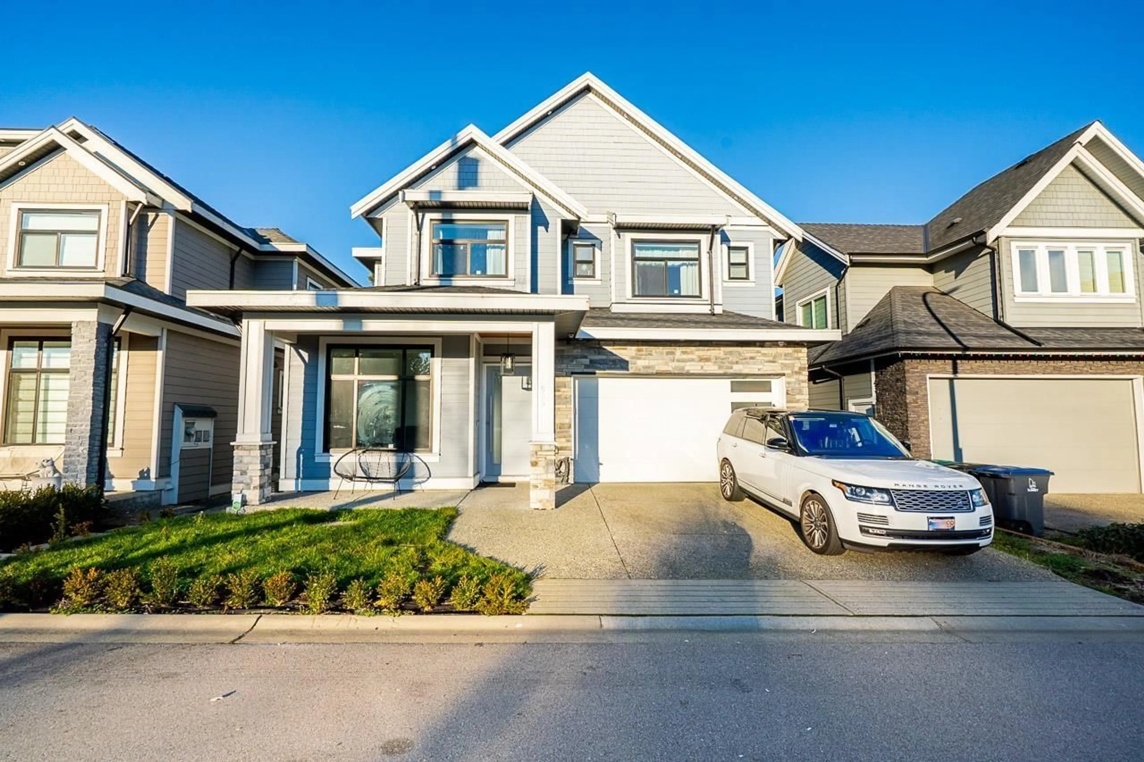 Home with vinyl exterior material, street for 17825 BARNSTON DRIVE DRIVE EAST, Surrey British Columbia V4N6T4