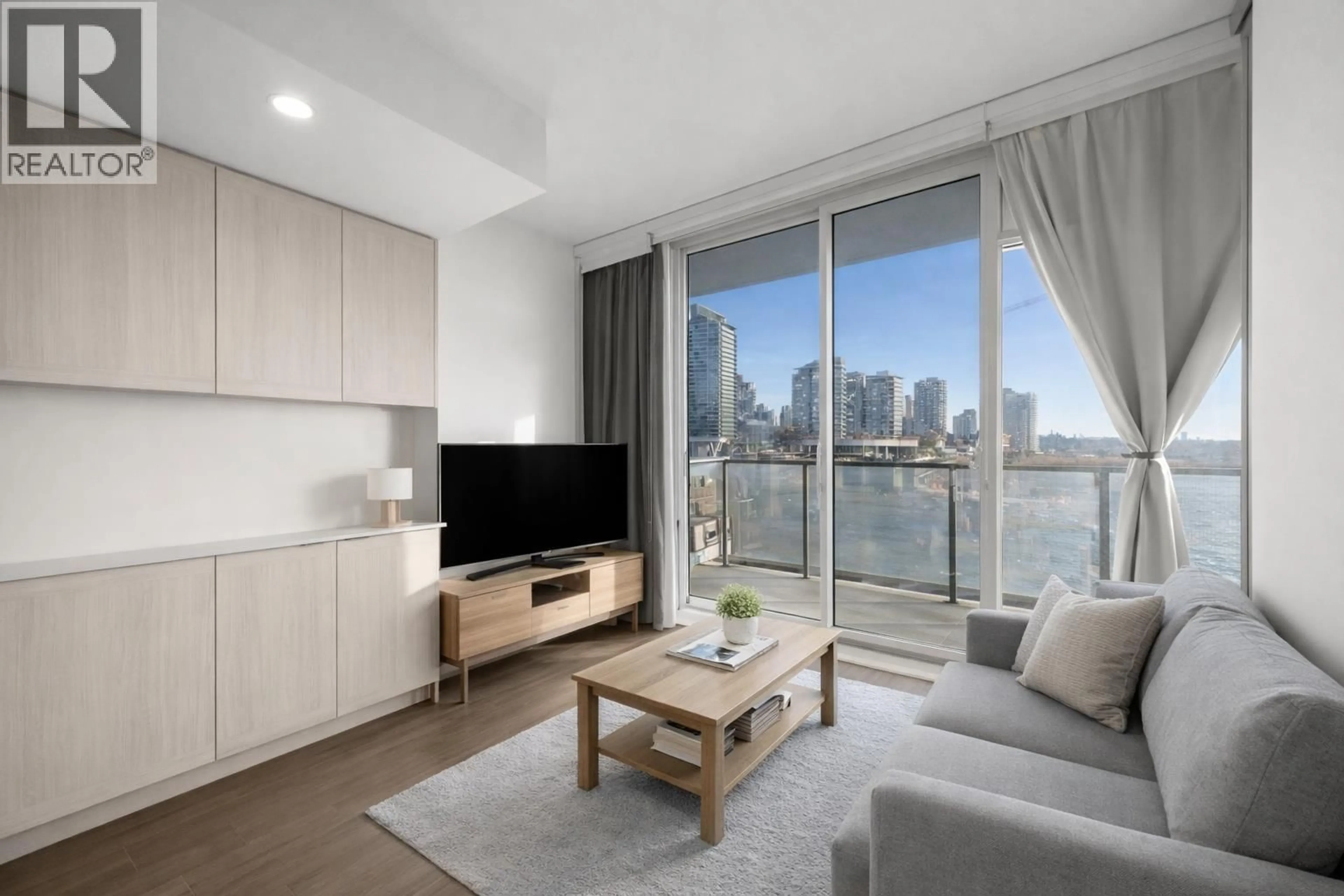 Living room with furniture, unknown for 703 - 2351 BETA AVENUE, Burnaby British Columbia V5C0M2