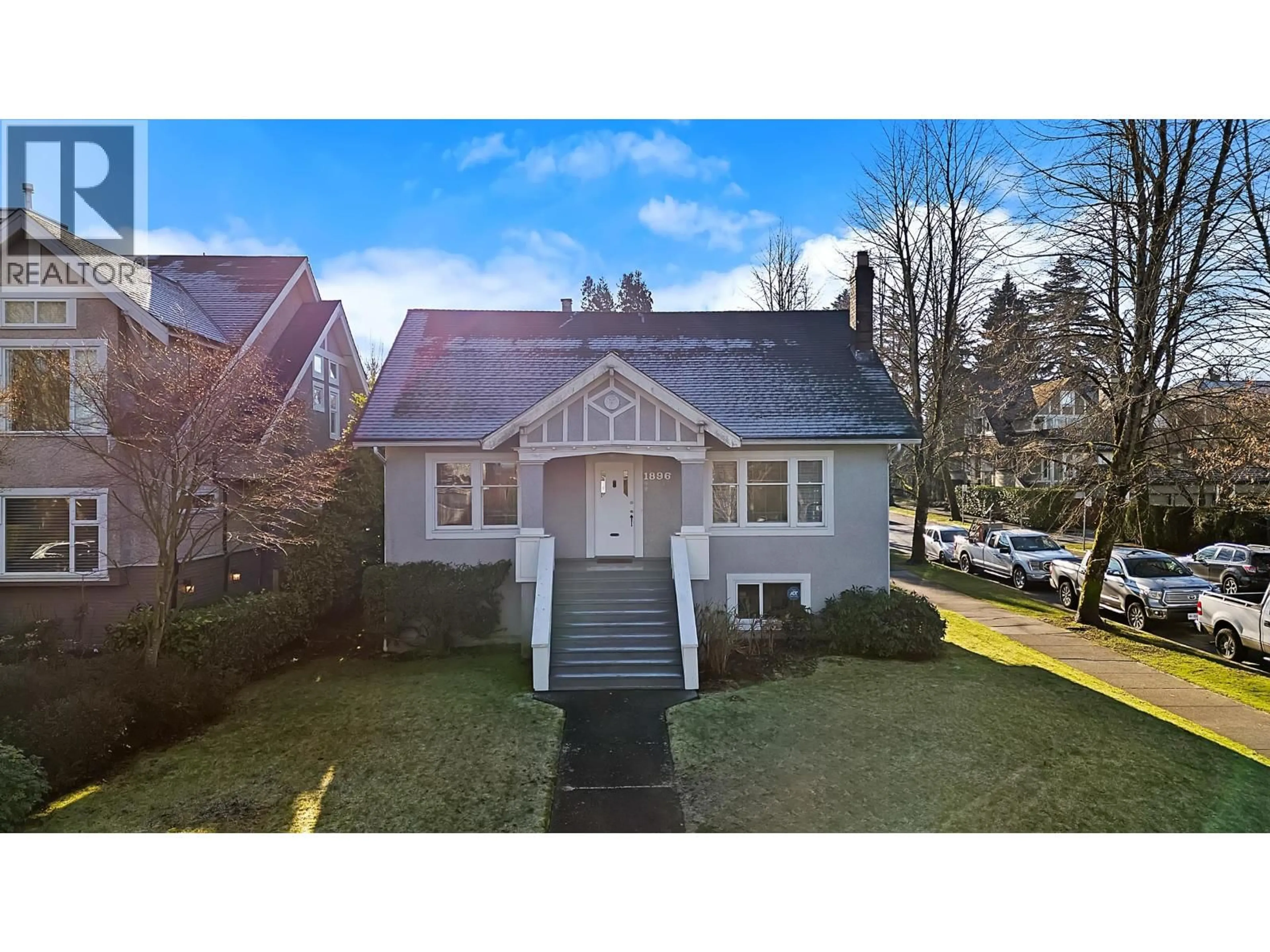 A pic from outside/outdoor area/front of a property/back of a property/a pic from drone, street for 1896 14TH AVENUE, Vancouver British Columbia V6J2J9