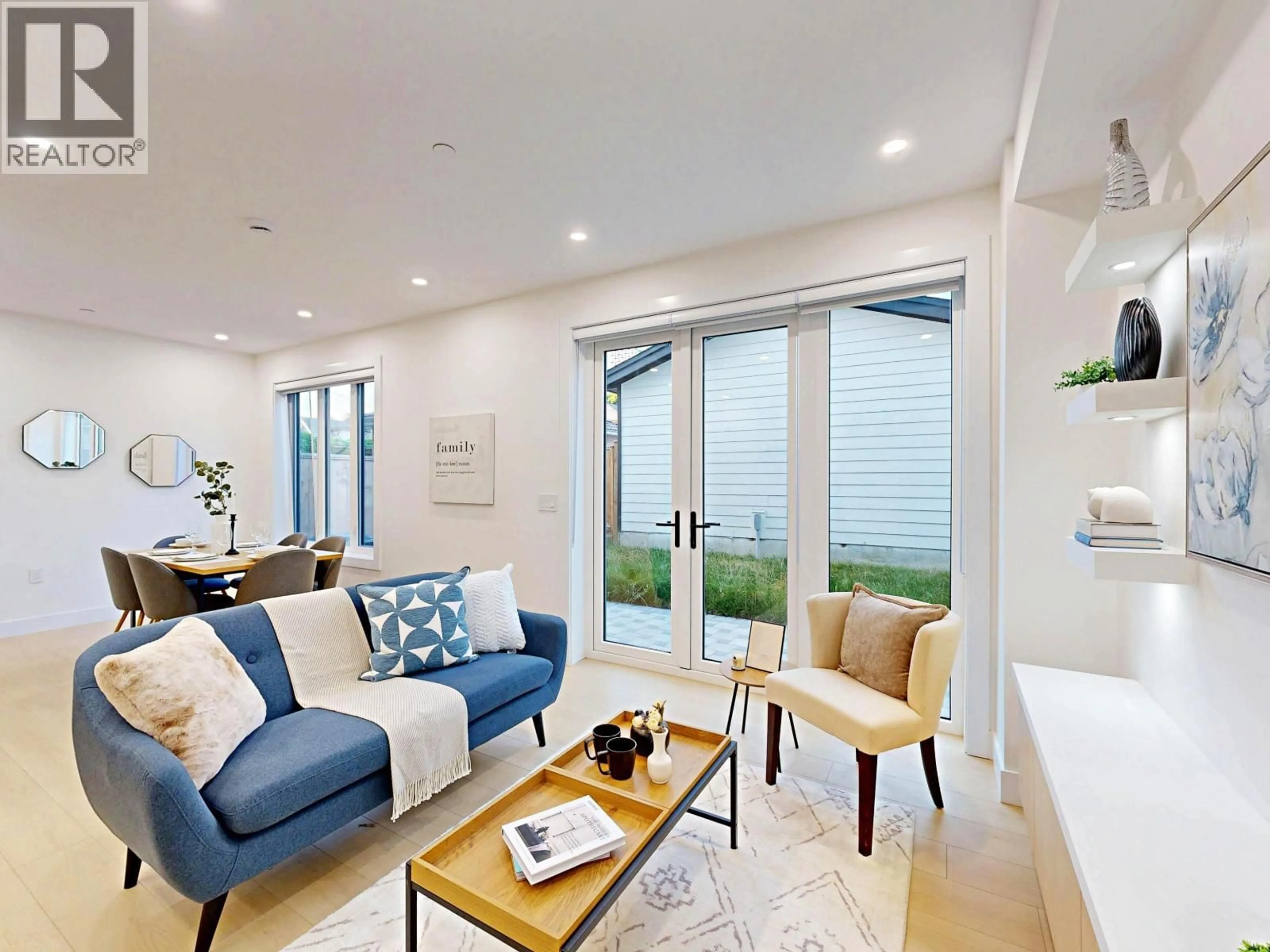 Living room with furniture, wood/laminate floor for 2 - 3425 ARCHIMEDES STREET, Vancouver British Columbia V5R4W4