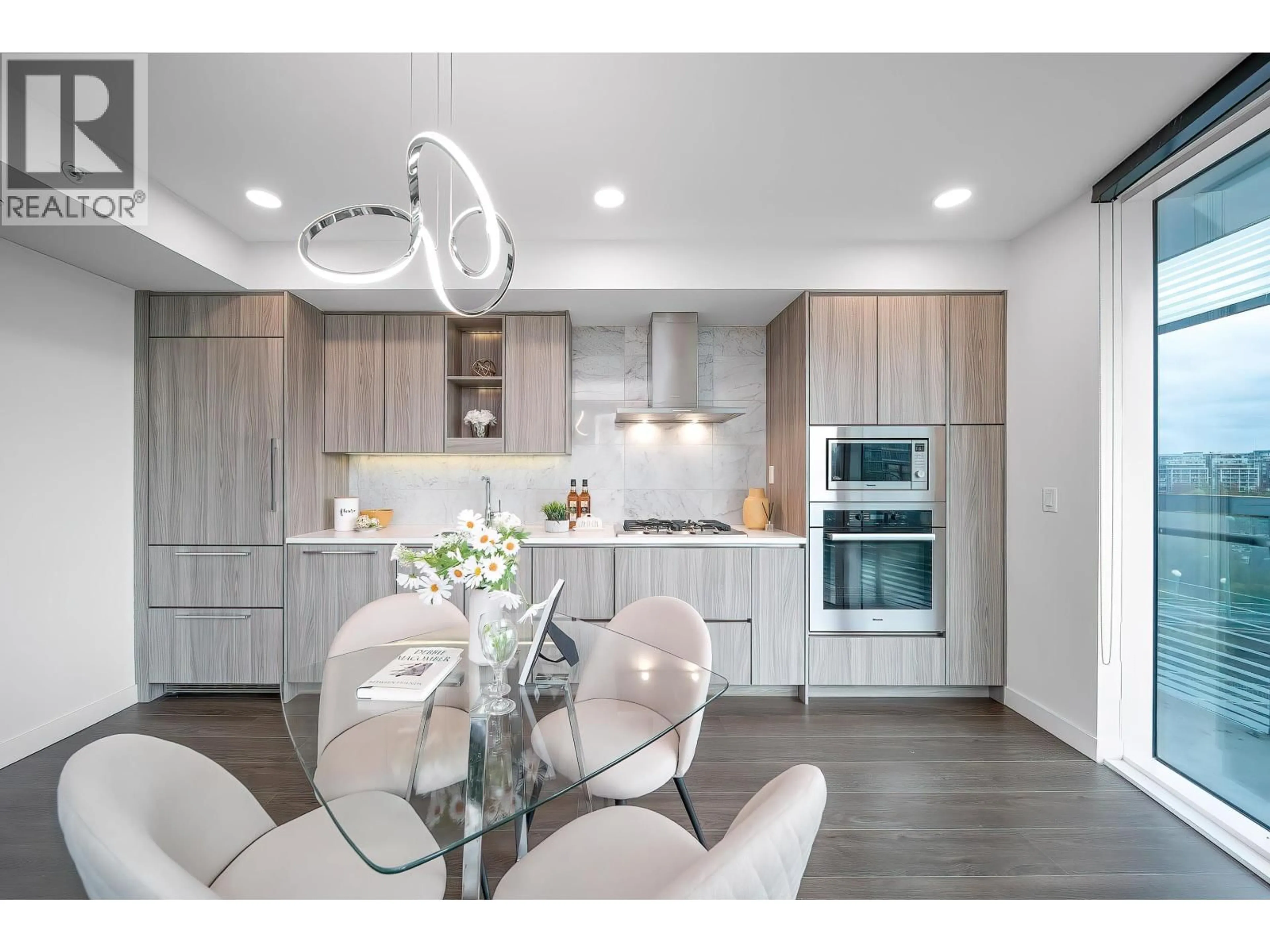 Open concept kitchen, wood/laminate floor for 785 - 87 NELSON STREET, Vancouver British Columbia V6Z0E8