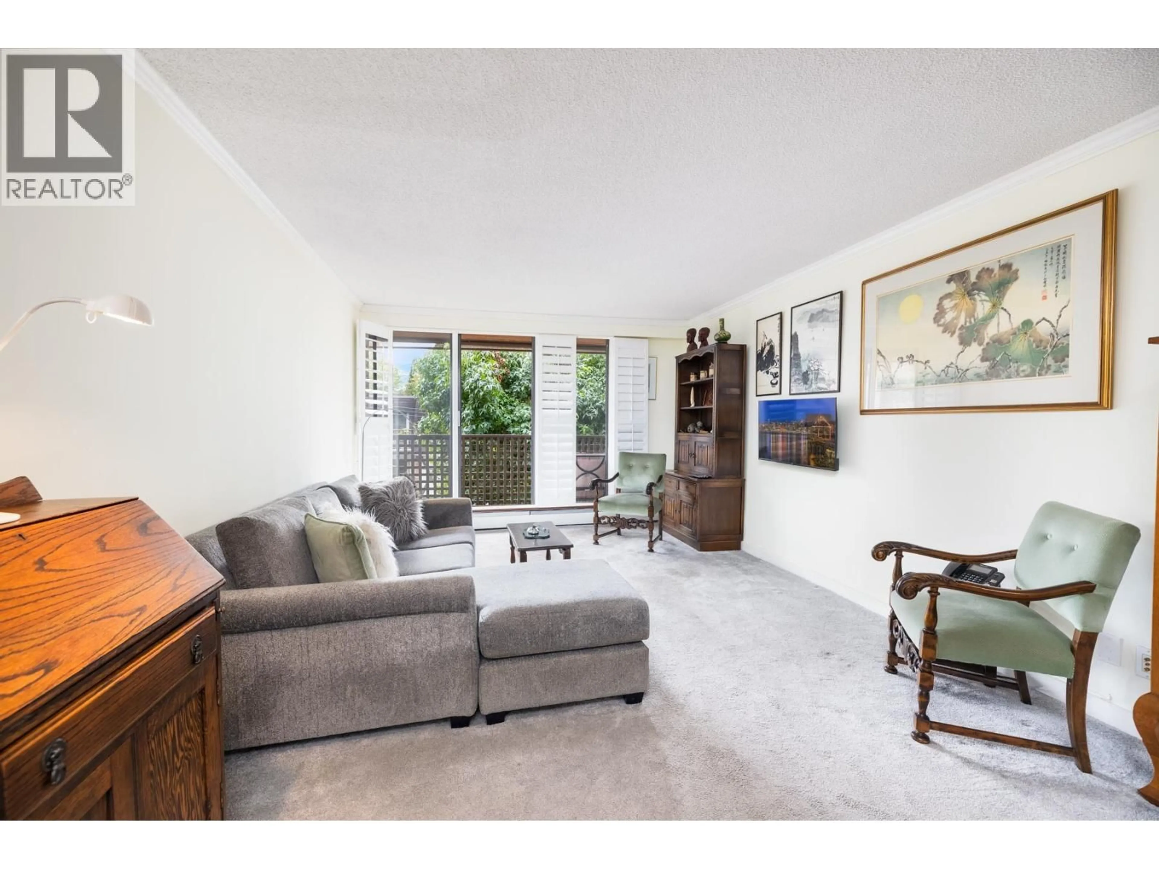 Living room with furniture, unknown for 209 - 141 13TH STREET, North Vancouver British Columbia V7M1N5