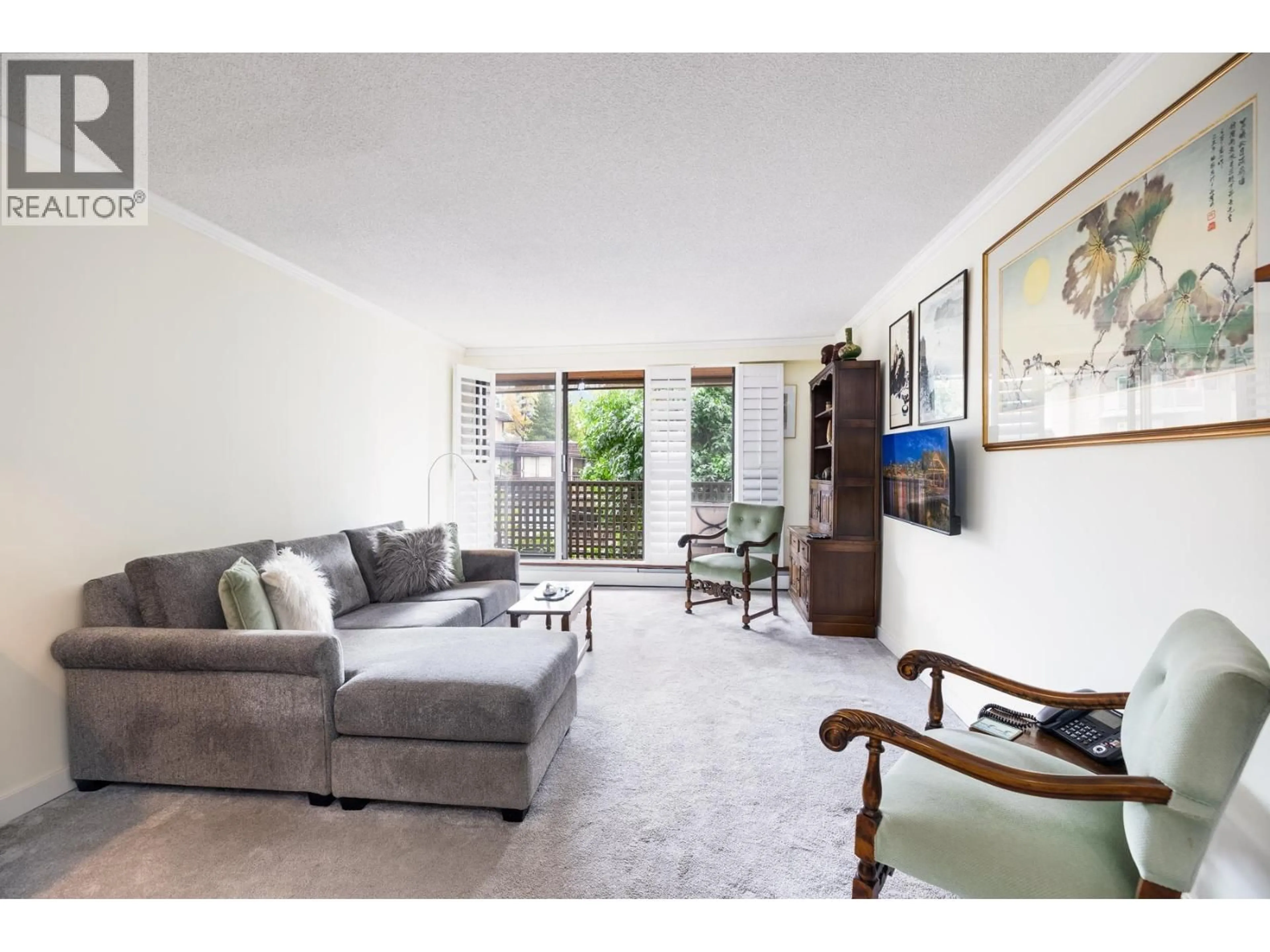 Living room with furniture, unknown for 209 - 141 13TH STREET, North Vancouver British Columbia V7M1N5