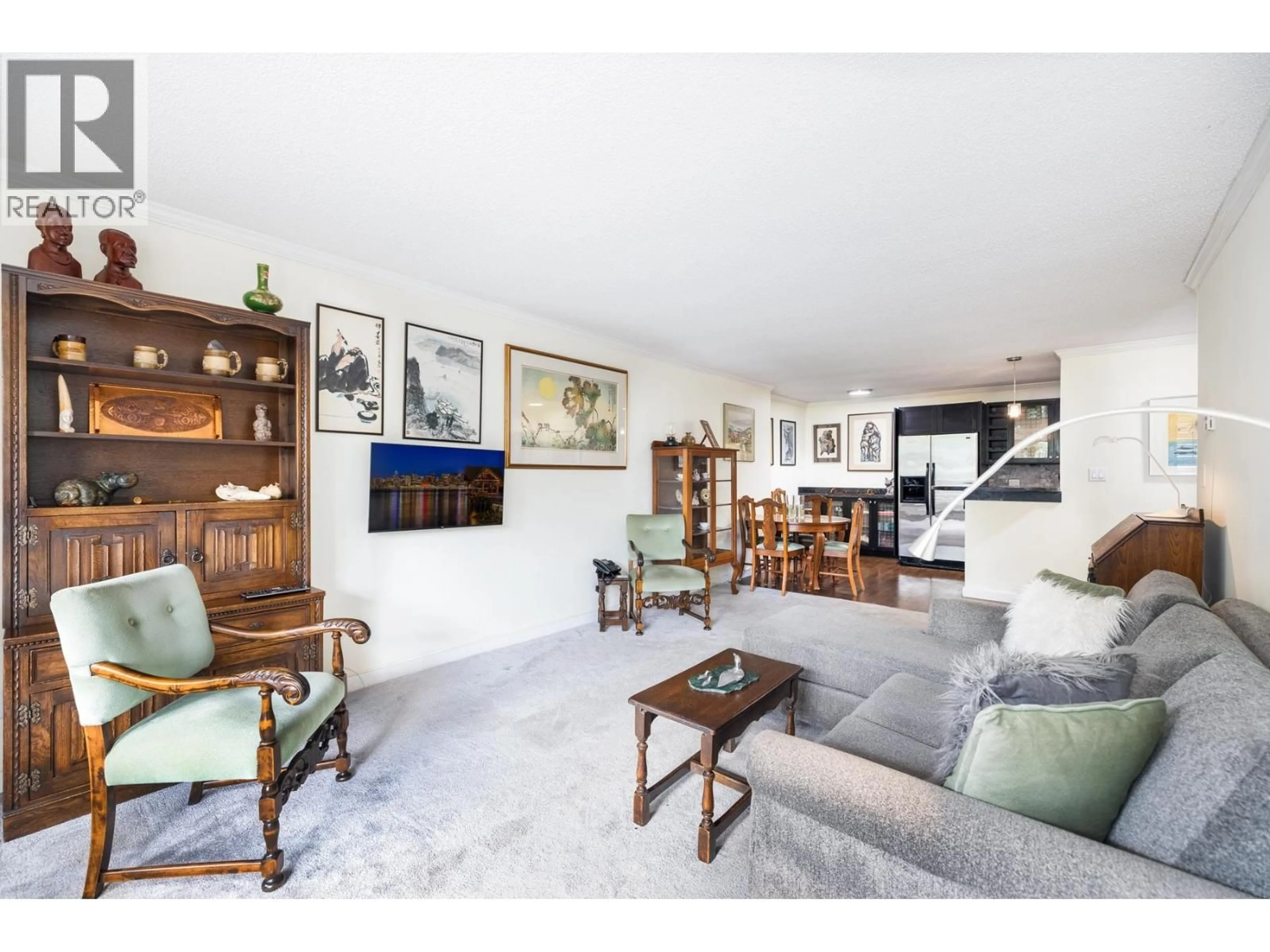 Living room with furniture, unknown for 209 - 141 13TH STREET, North Vancouver British Columbia V7M1N5