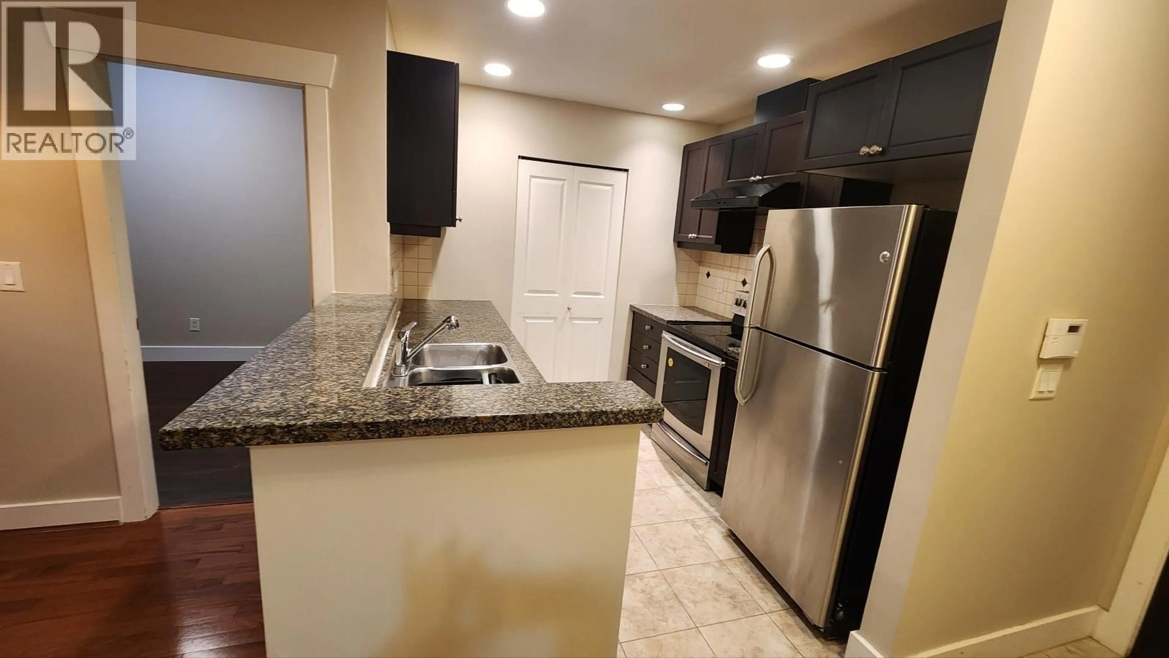 Standard kitchen, ceramic/tile floor for 114 - 6279 EAGLES DRIVE, Vancouver British Columbia V6T2K7