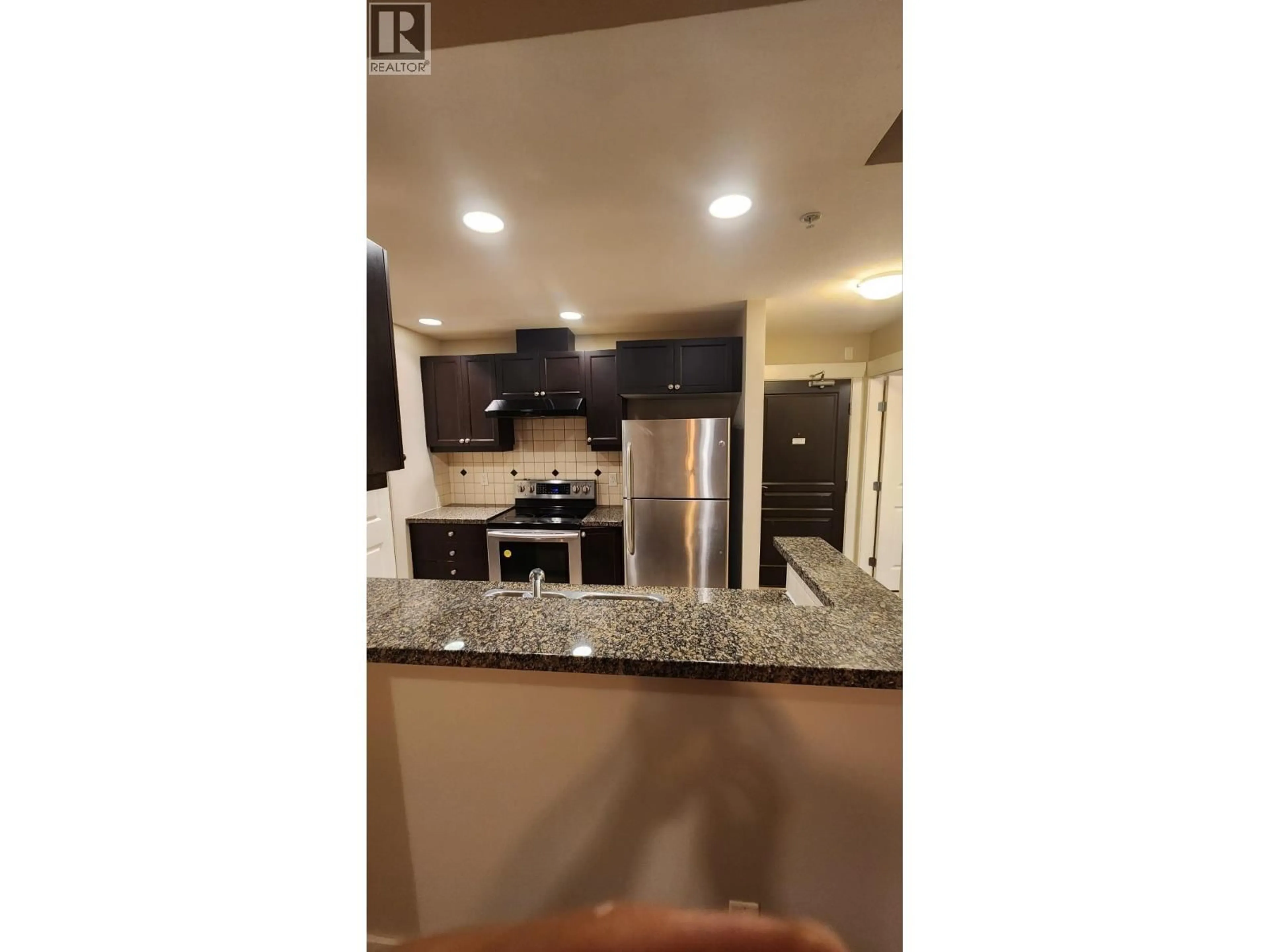 Open concept kitchen, unknown for 114 - 6279 EAGLES DRIVE, Vancouver British Columbia V6T2K7