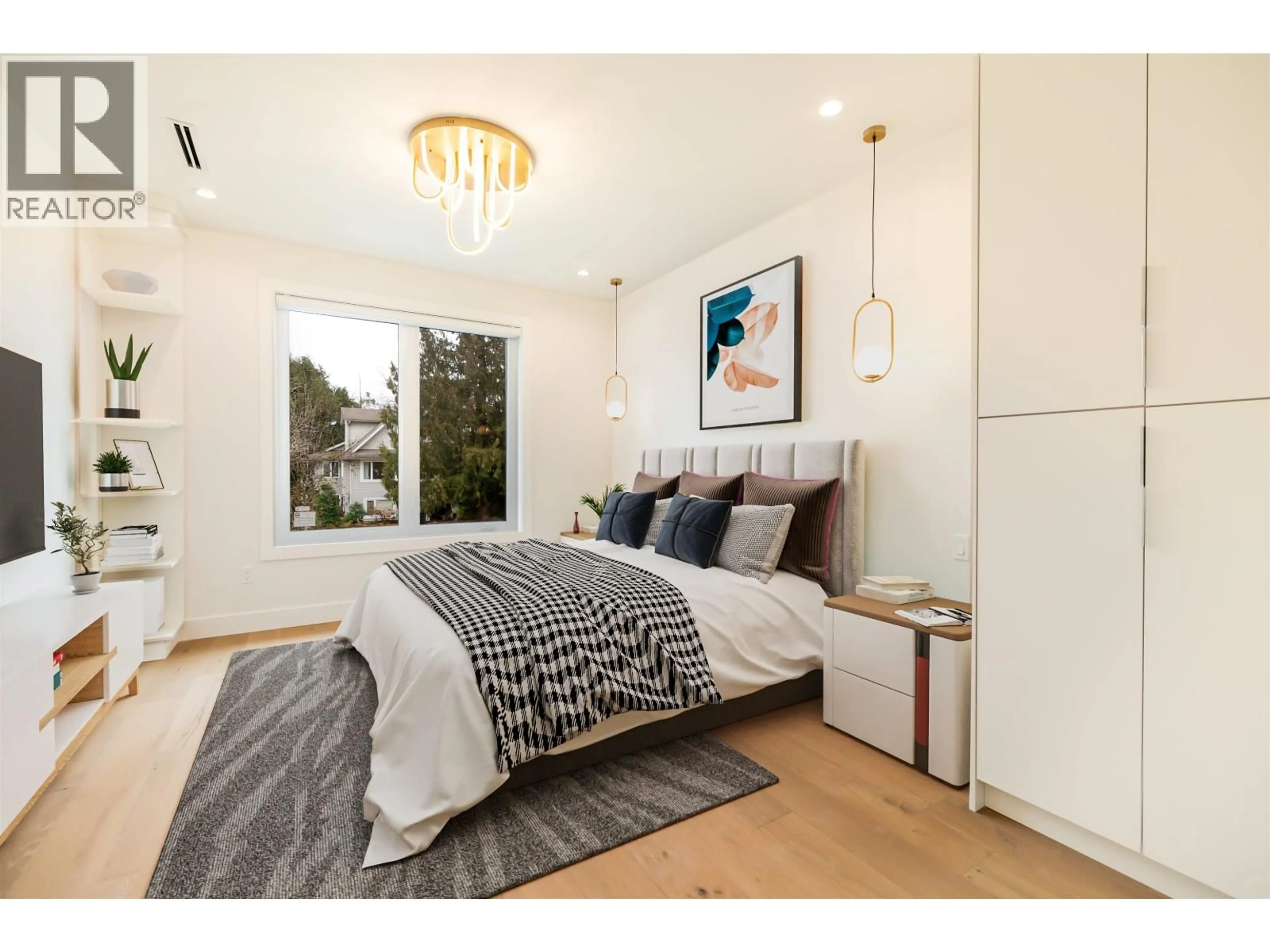 Bedroom with bed, wood/laminate floor for 8057 18TH AVENUE, Burnaby British Columbia V3N1J9