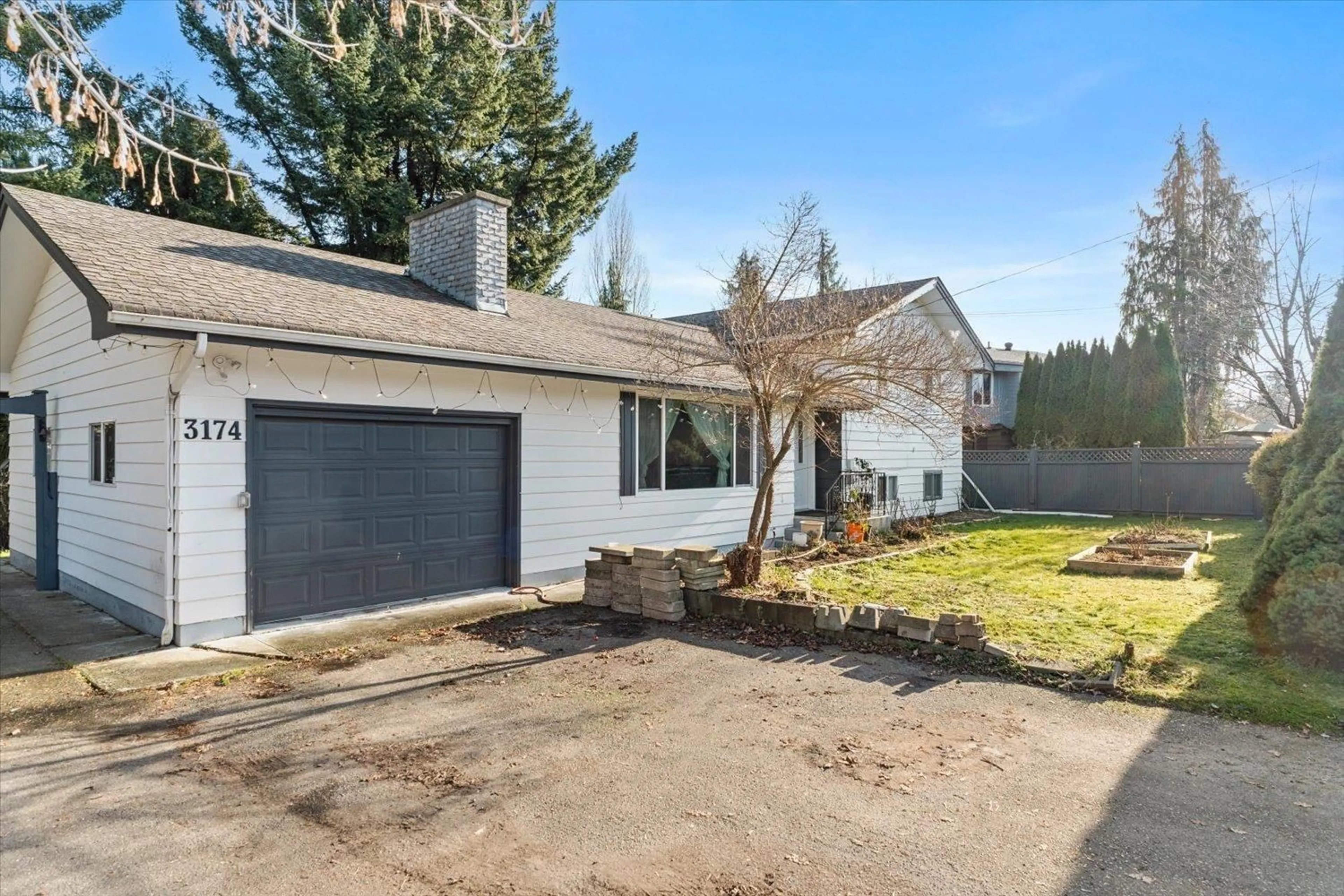 A pic from outside/outdoor area/front of a property/back of a property/a pic from drone, street for 3174 268 STREET, Langley British Columbia V4W3E4