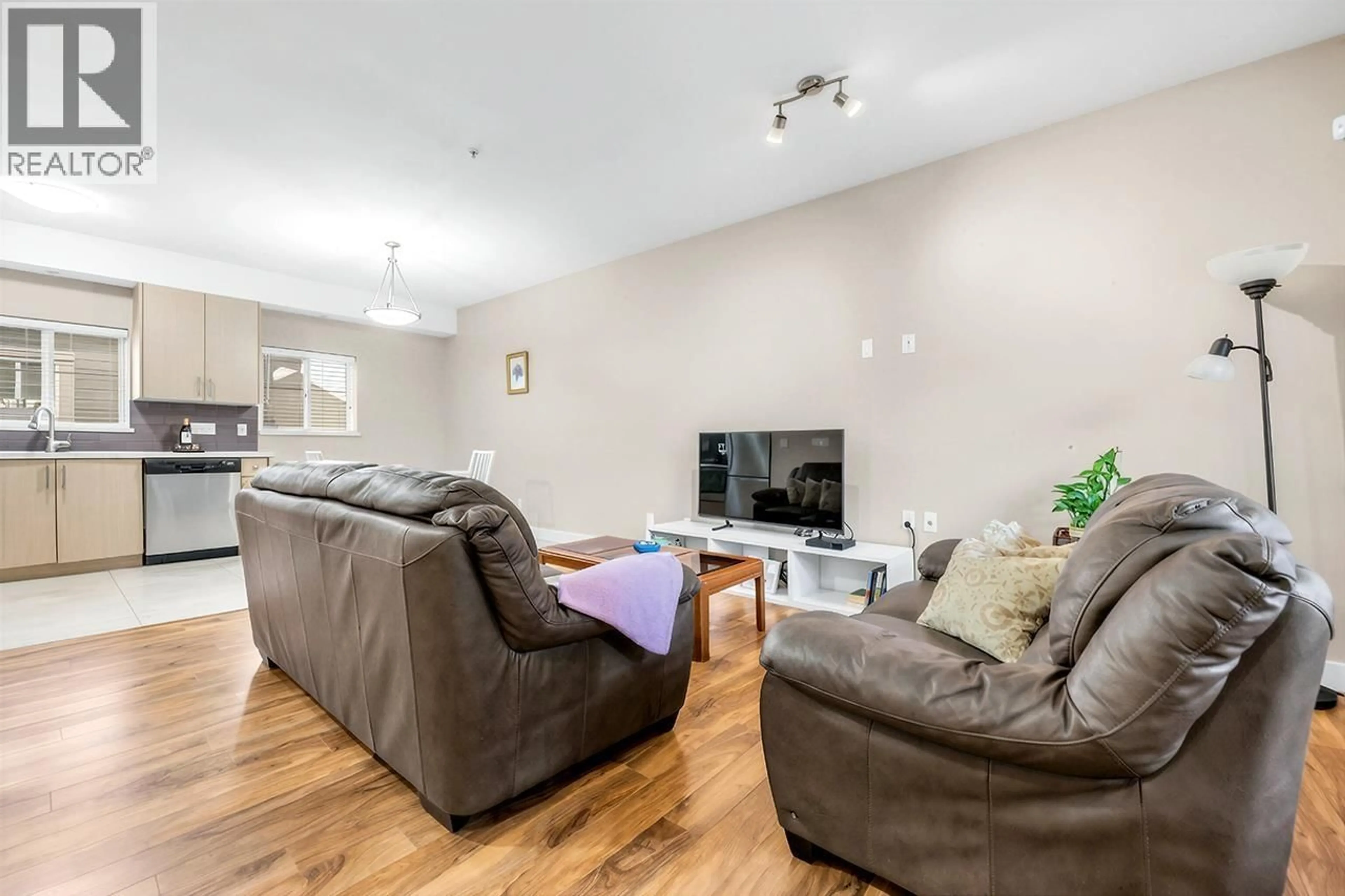 Living room with furniture, wood/laminate floor for 121 - 3888 NORFOLK STREET, Burnaby British Columbia V5G1E5