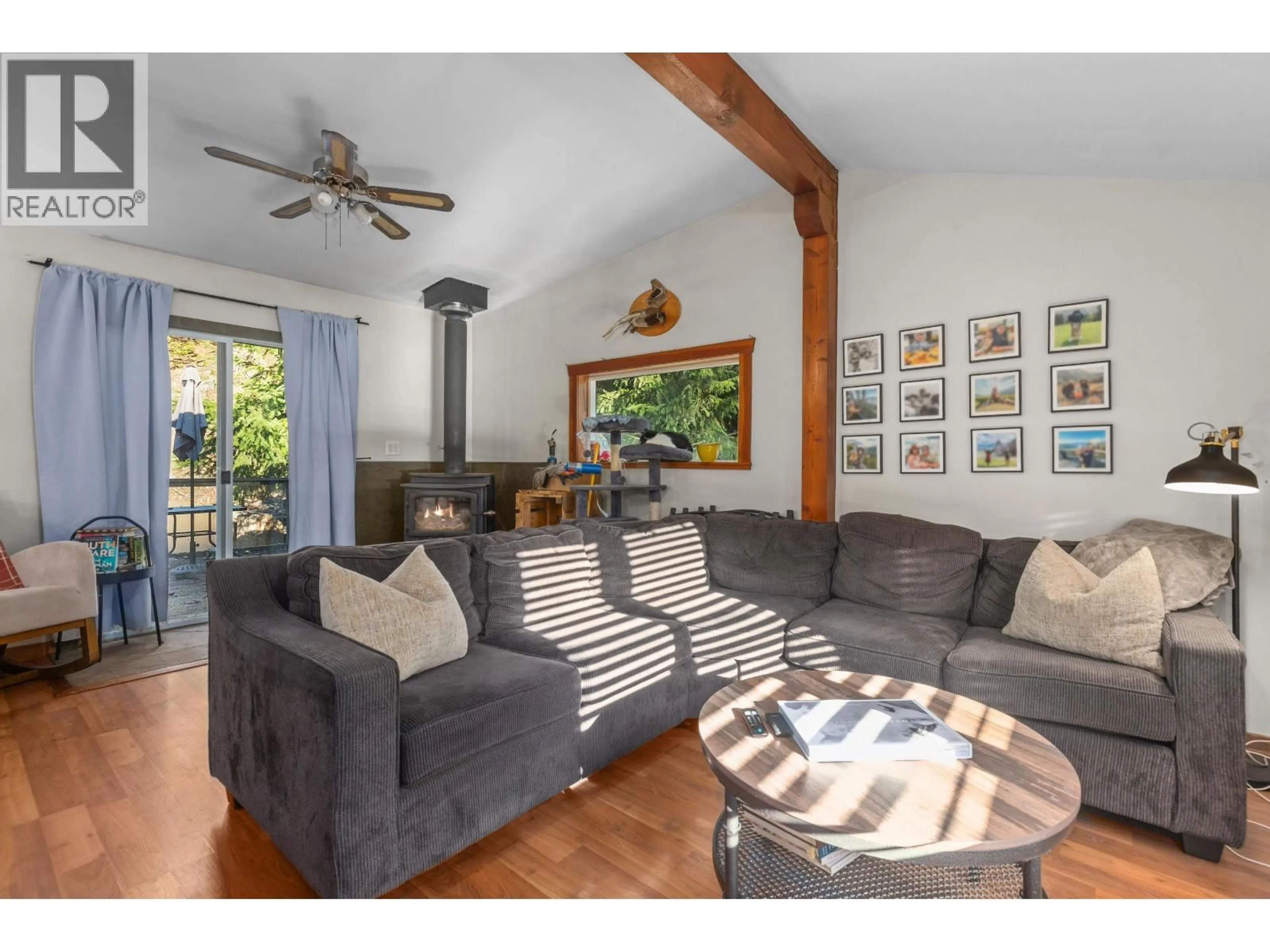 Living room with furniture, wood/laminate floor for 9245 PEMBERTON PORTAGE ROAD, D'Arcy British Columbia V0N1L0