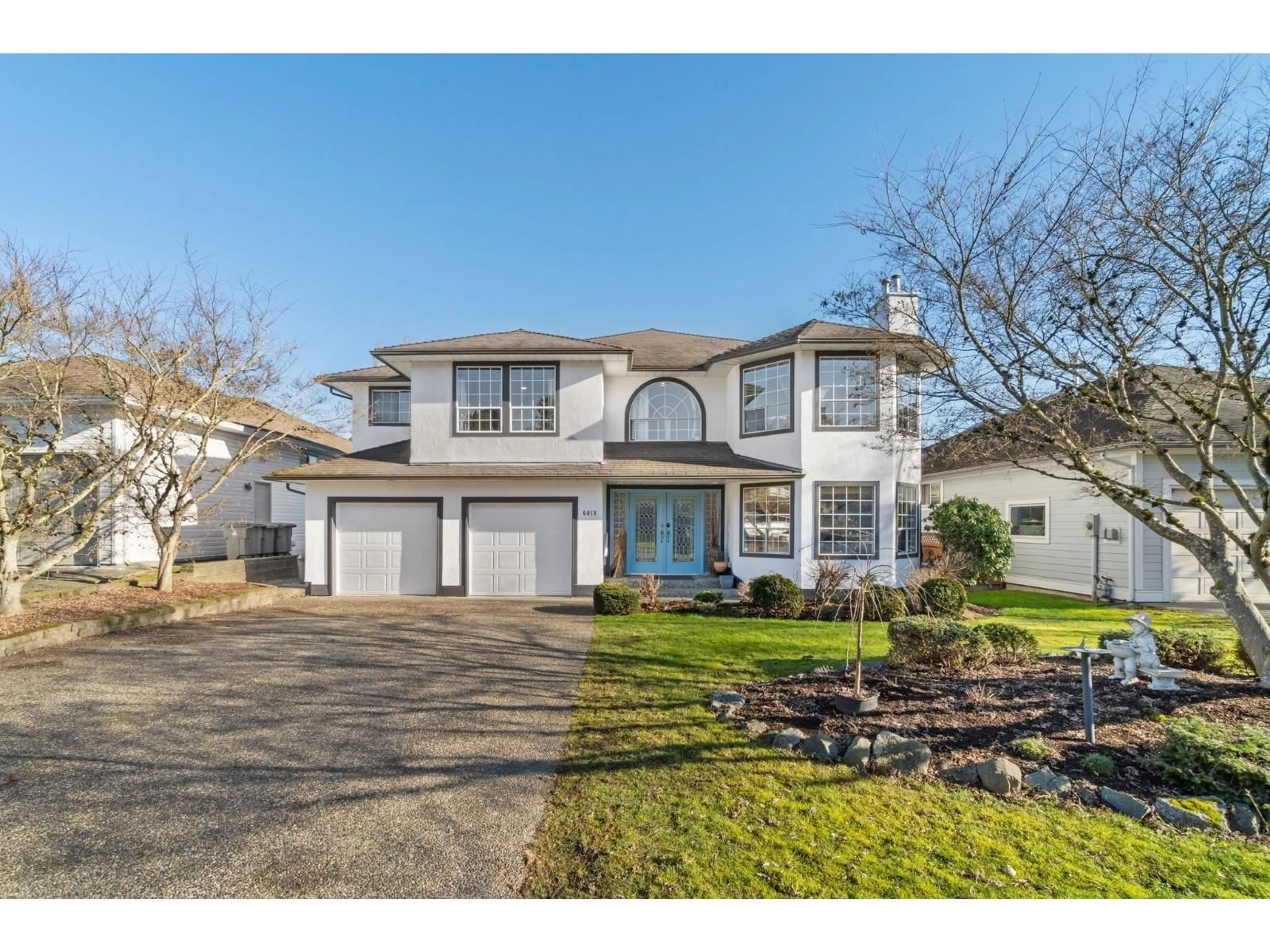 Home with vinyl exterior material, street for 6018 189A STREET, Surrey British Columbia V3S8A3