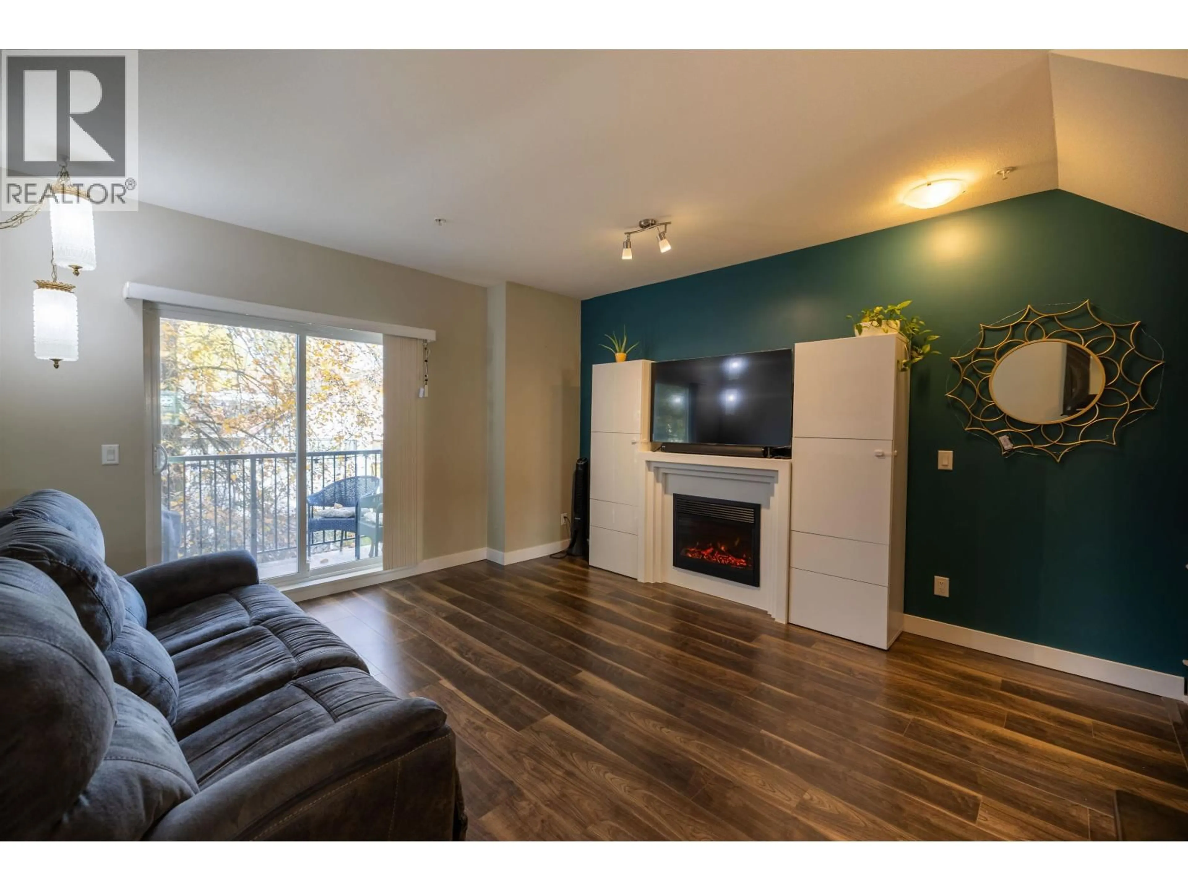 Living room with furniture, wood/laminate floor for 229 - 3888 NORFOLK STREET, Burnaby British Columbia V5G1E5