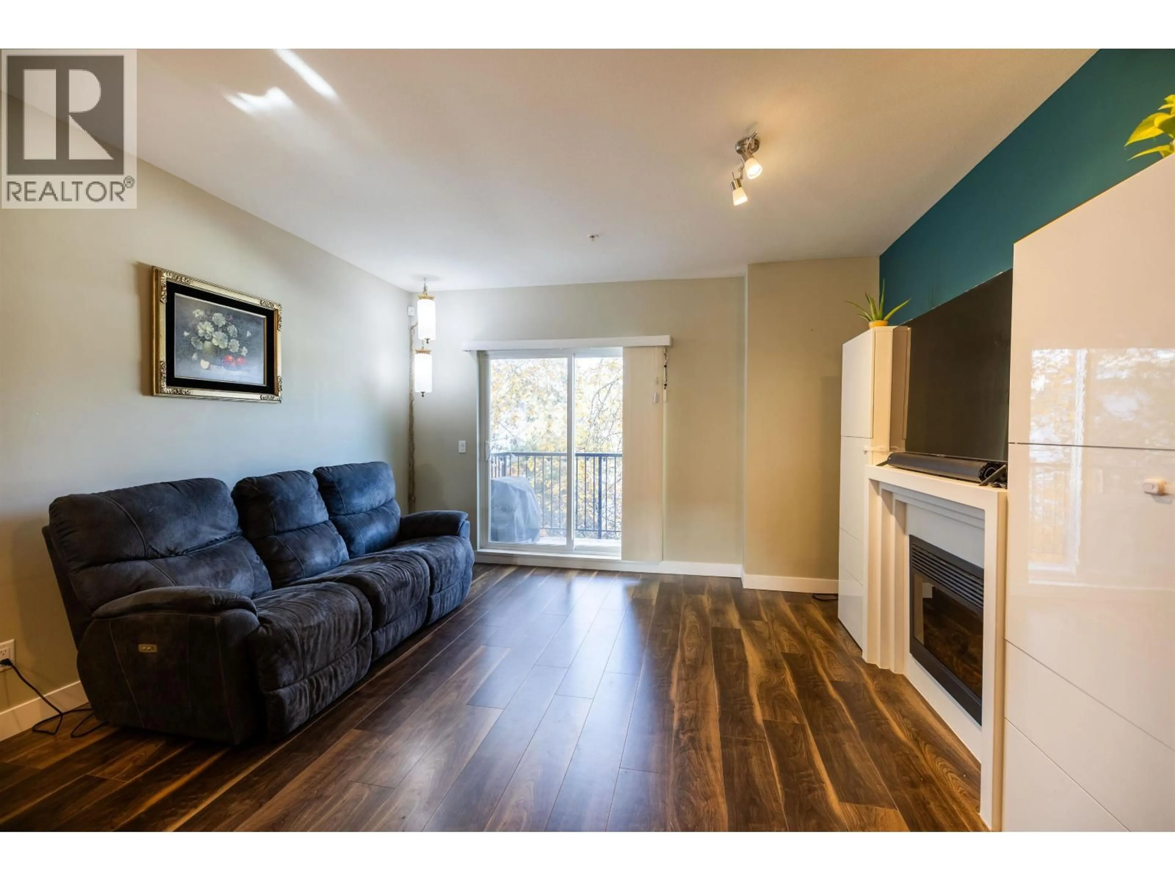 Living room with furniture, wood/laminate floor for 229 - 3888 NORFOLK STREET, Burnaby British Columbia V5G1E5
