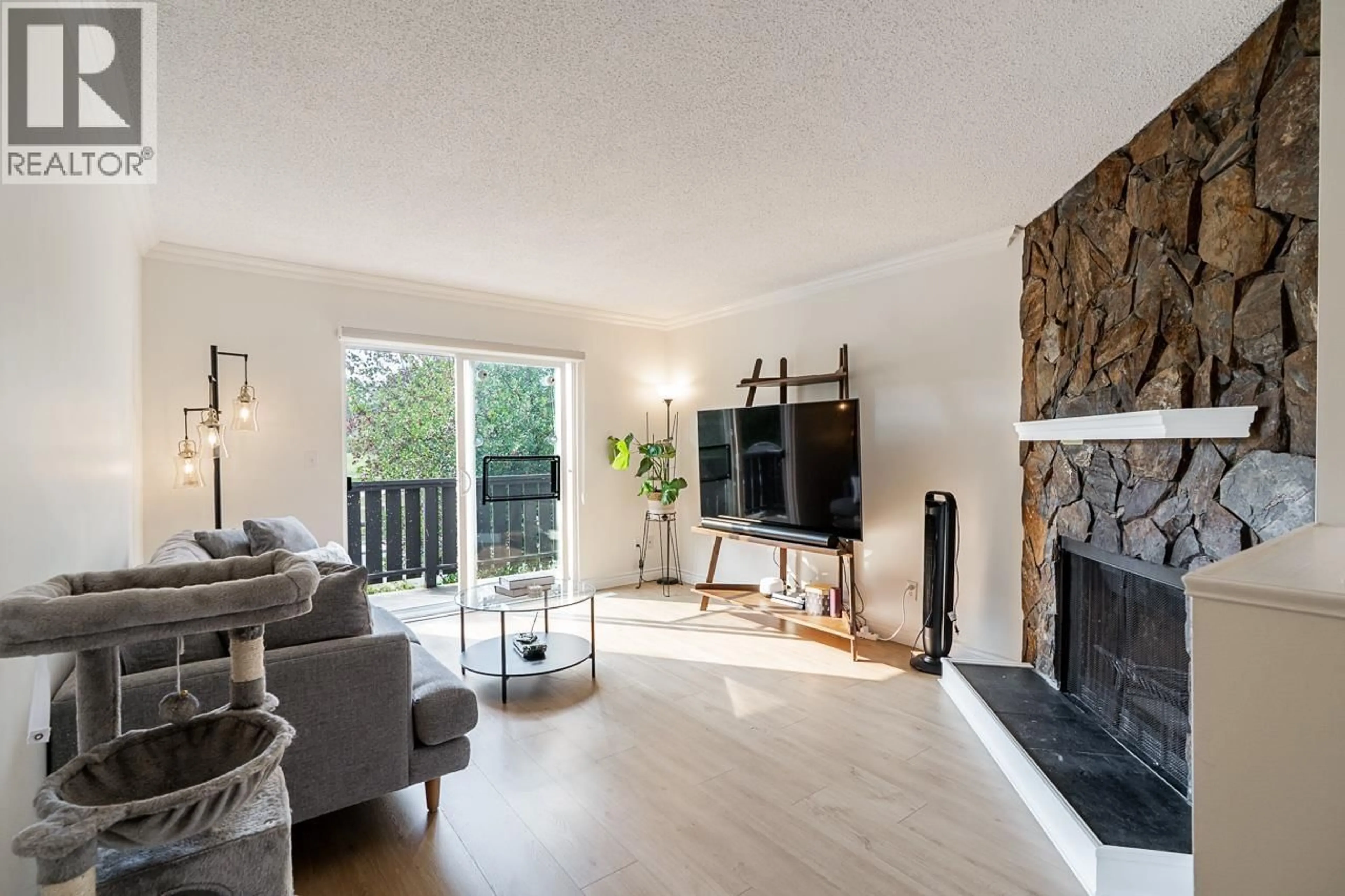 Living room with furniture, wood/laminate floor for 1185 EAGLERIDGE DRIVE, Coquitlam British Columbia V3E1J8