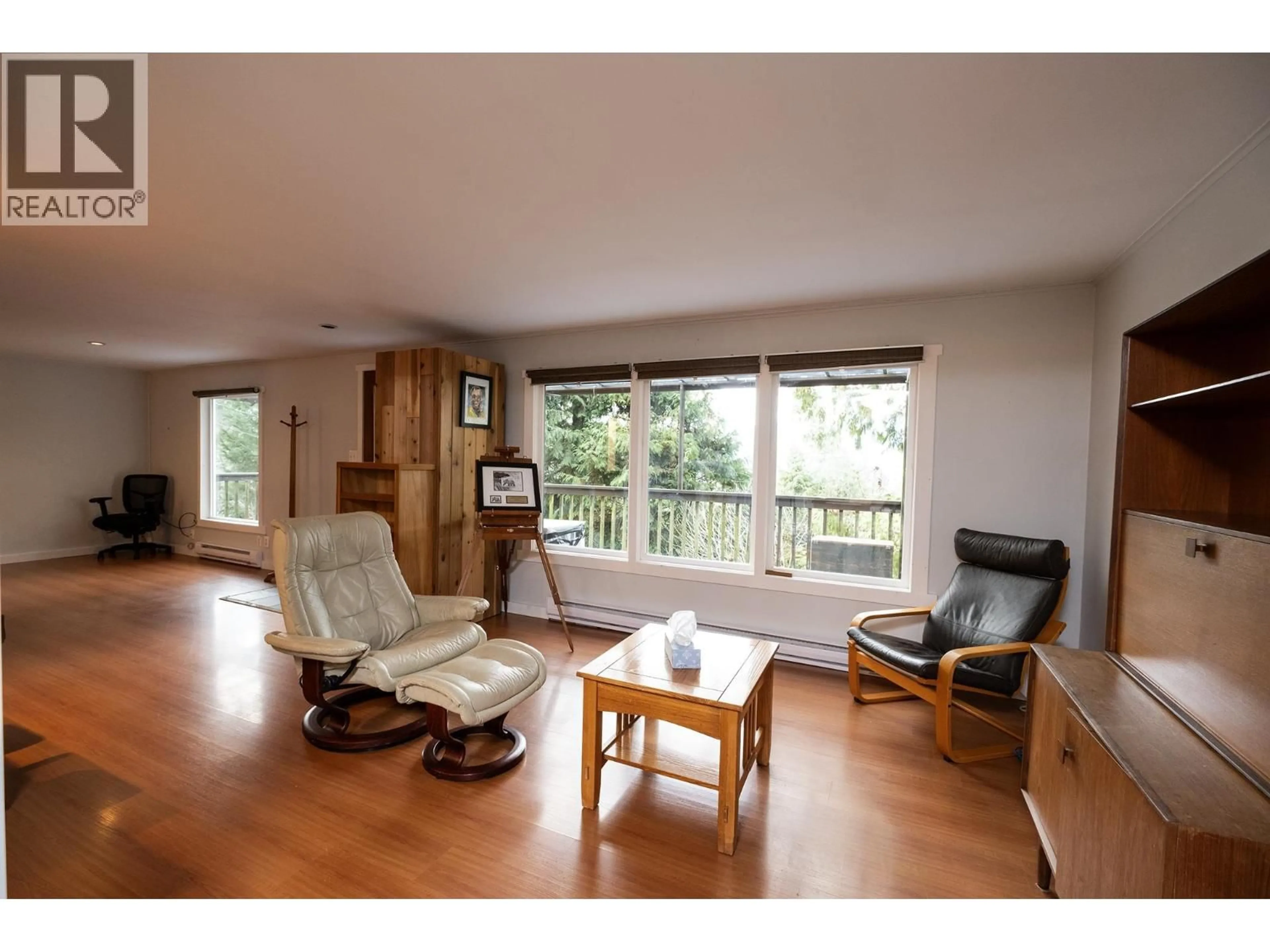 Living room with furniture, wood/laminate floor for 5863 SANDY HOOK ROAD, Sechelt British Columbia V7Z0C8