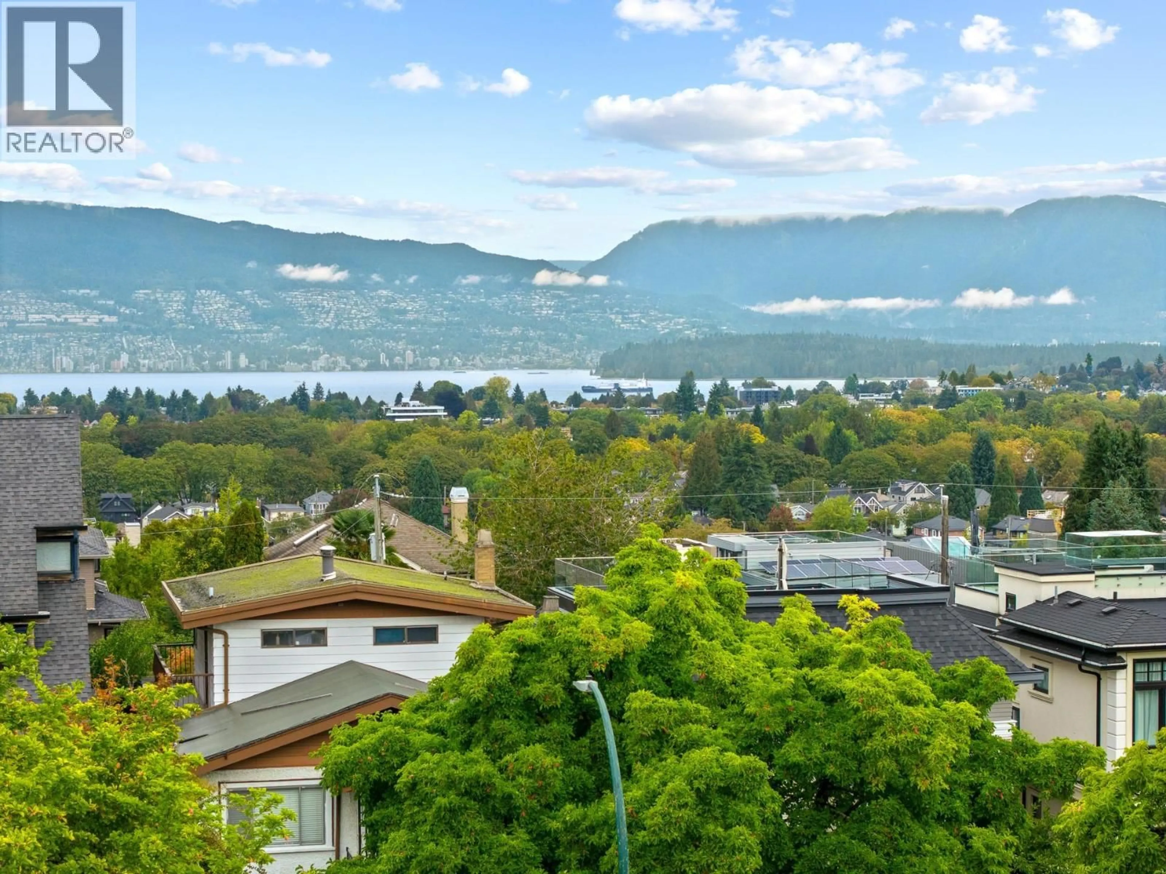 A pic from outside/outdoor area/front of a property/back of a property/a pic from drone, mountain view for 3276 21ST AVENUE, Vancouver British Columbia V6L1L2