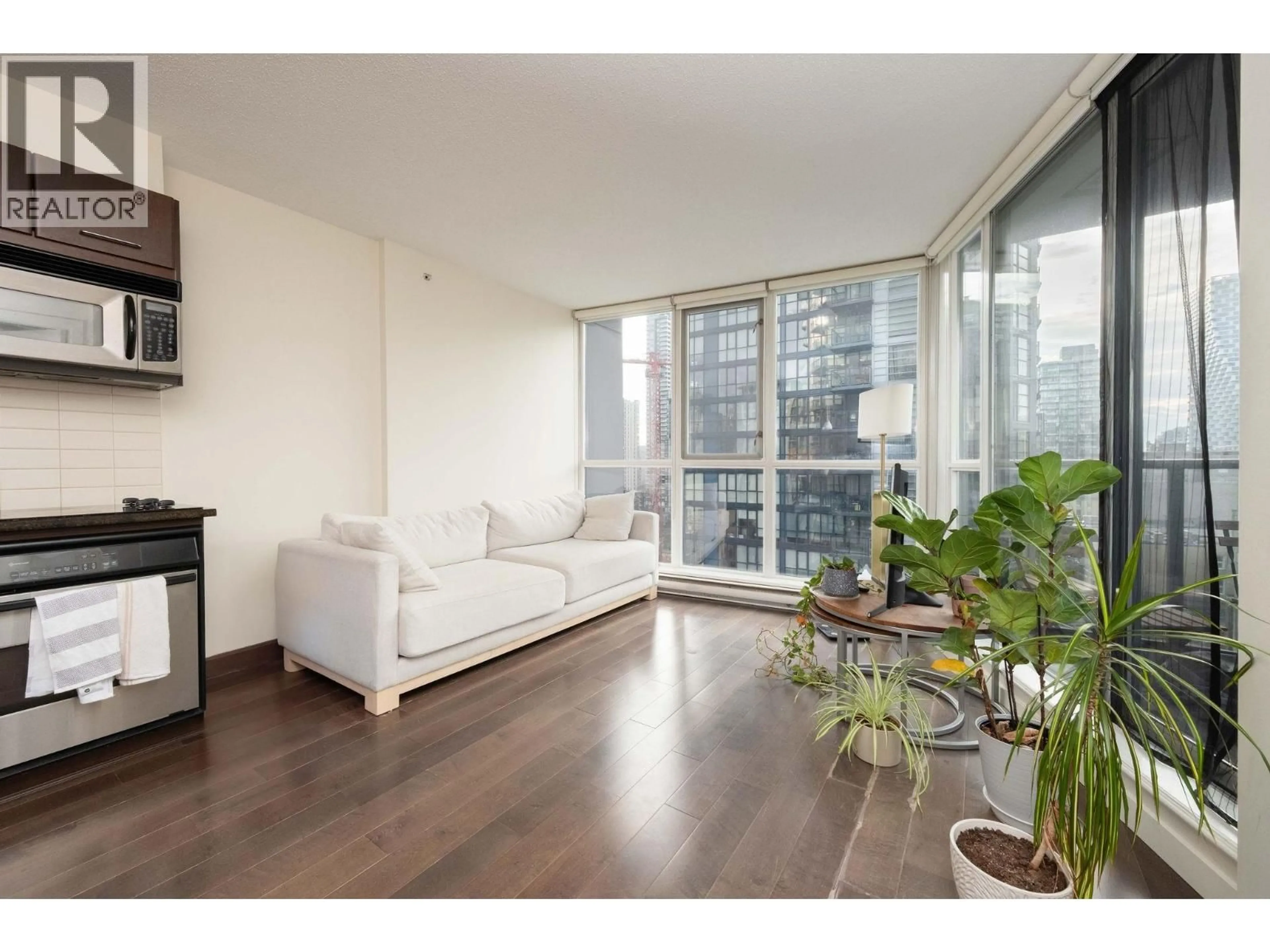 Living room with furniture, wood/laminate floor for 908 - 1155 SEYMOUR STREET, Vancouver British Columbia V6B1K2