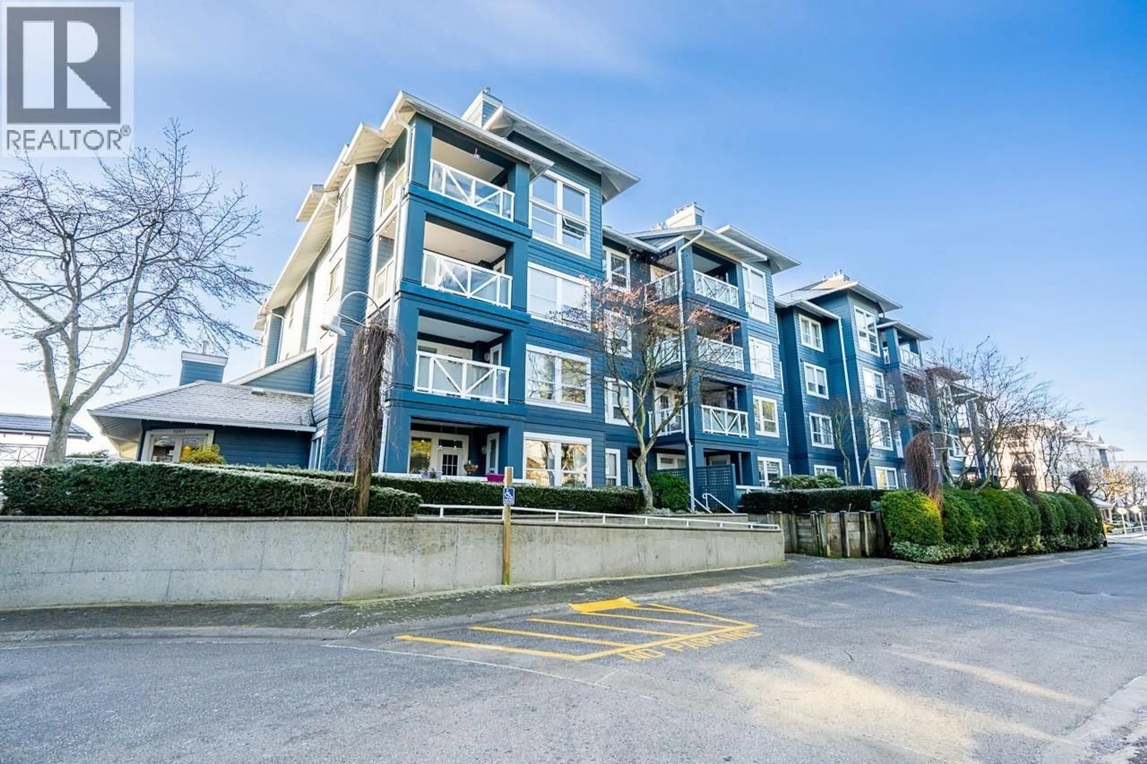 A pic from outside/outdoor area/front of a property/back of a property/a pic from drone, building for 106 - 12911 RAILWAY AVENUE, Richmond British Columbia V7E6L8