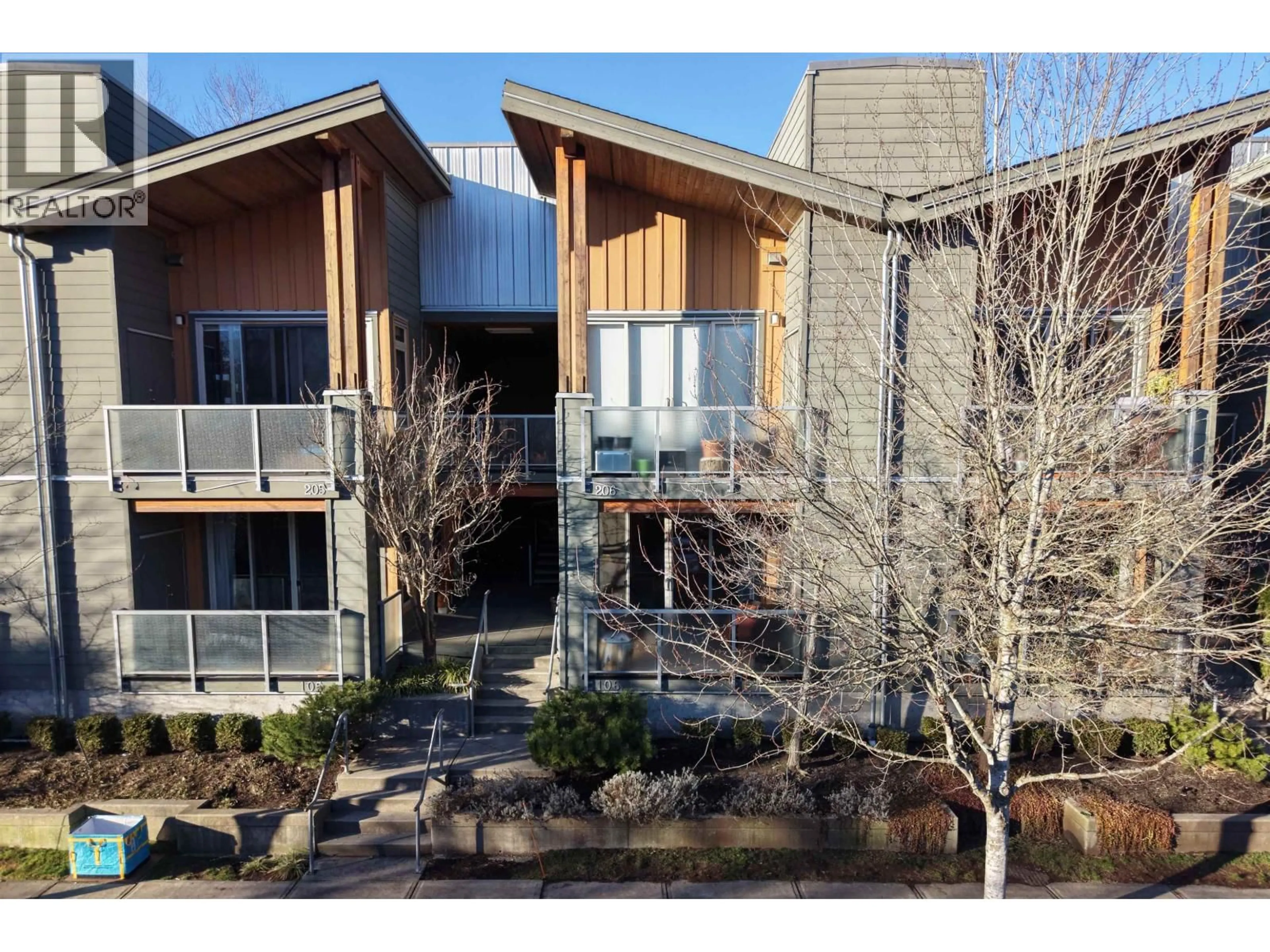 A pic from outside/outdoor area/front of a property/back of a property/a pic from drone, building for 106 - 40147 GOVERNMENT ROAD, Squamish British Columbia V8B0R6