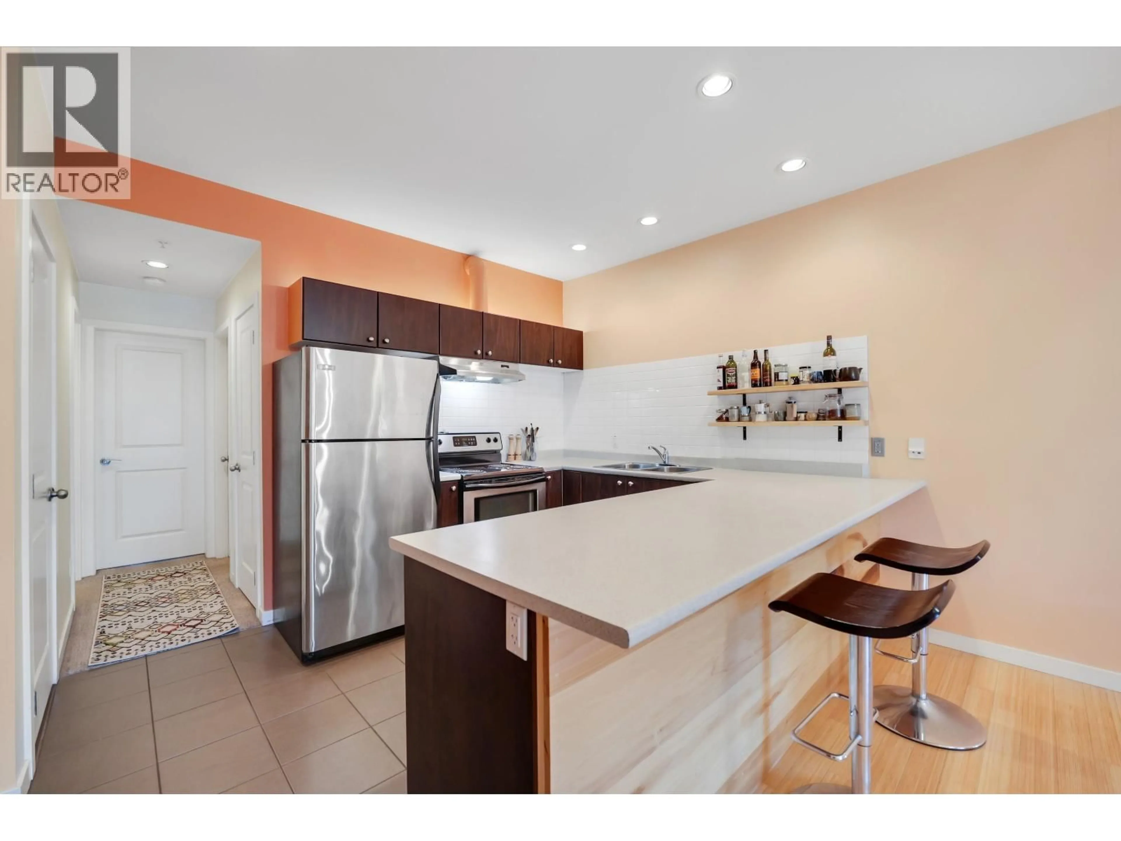 Open concept kitchen, unknown for 106 - 40147 GOVERNMENT ROAD, Squamish British Columbia V8B0R6