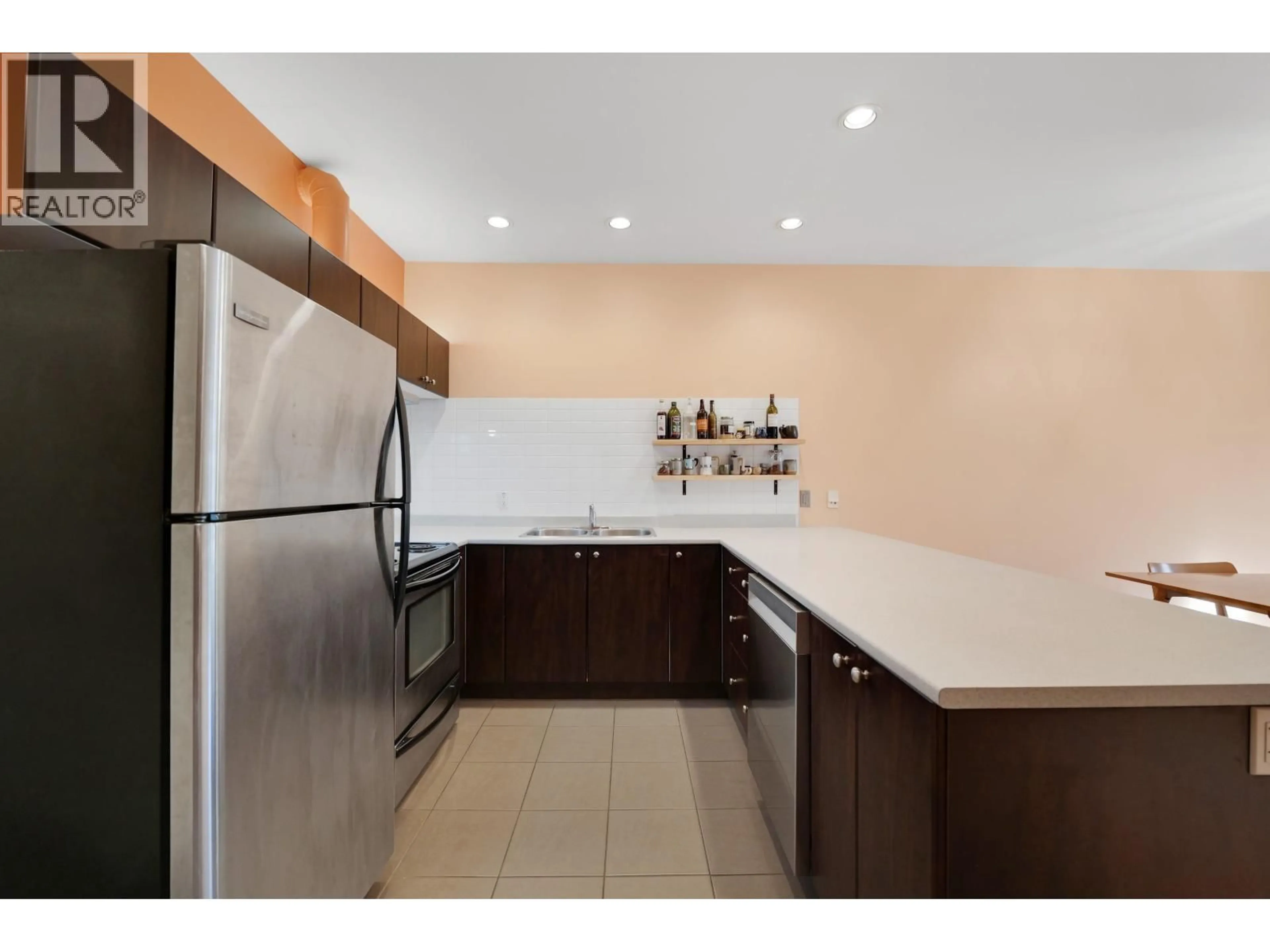 Standard kitchen, ceramic/tile floor for 106 - 40147 GOVERNMENT ROAD, Squamish British Columbia V8B0R6