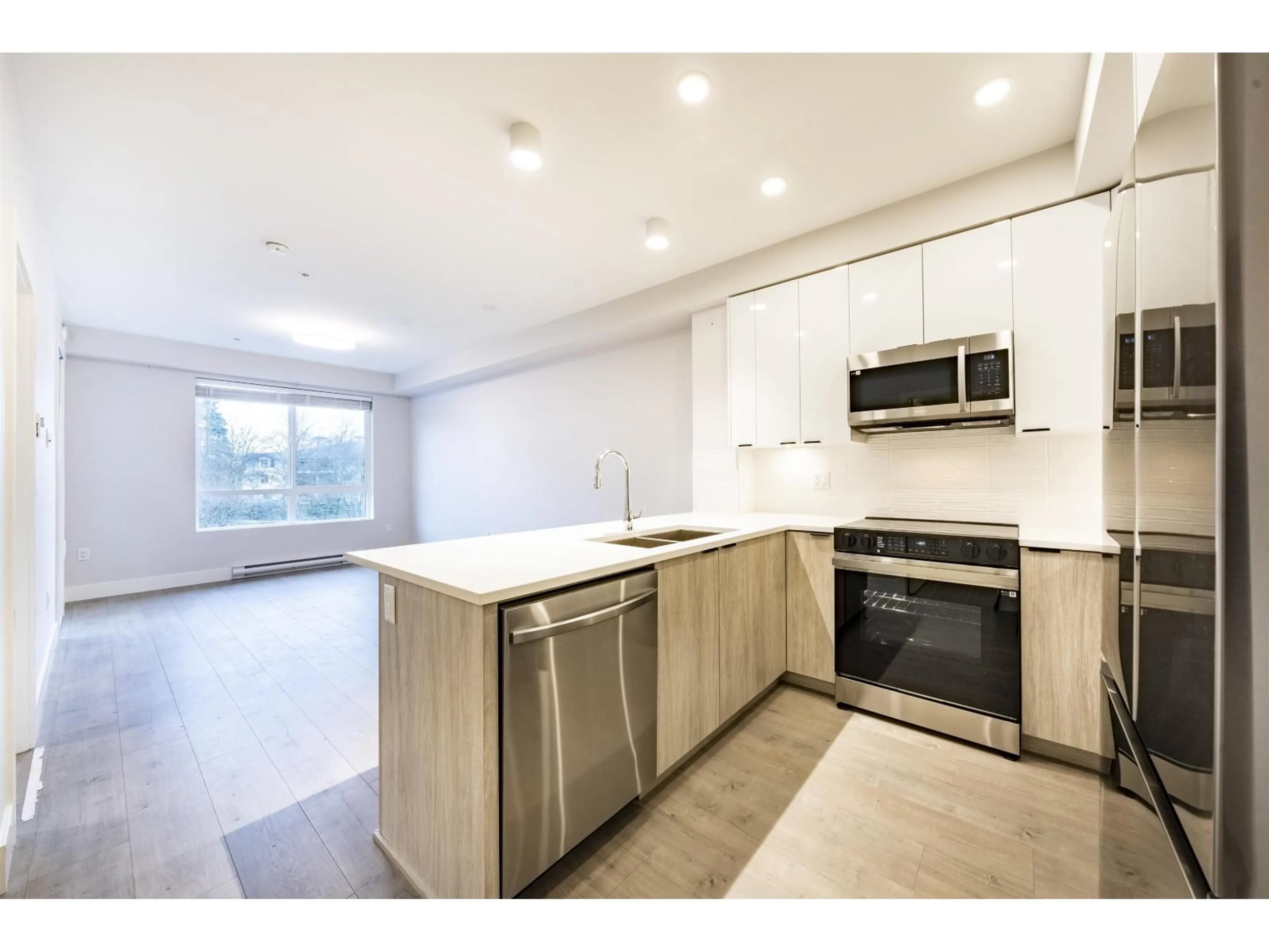 Open concept kitchen, unknown for 204 - 20061 FRASER HIGHWAY, Langley British Columbia V3A0R4