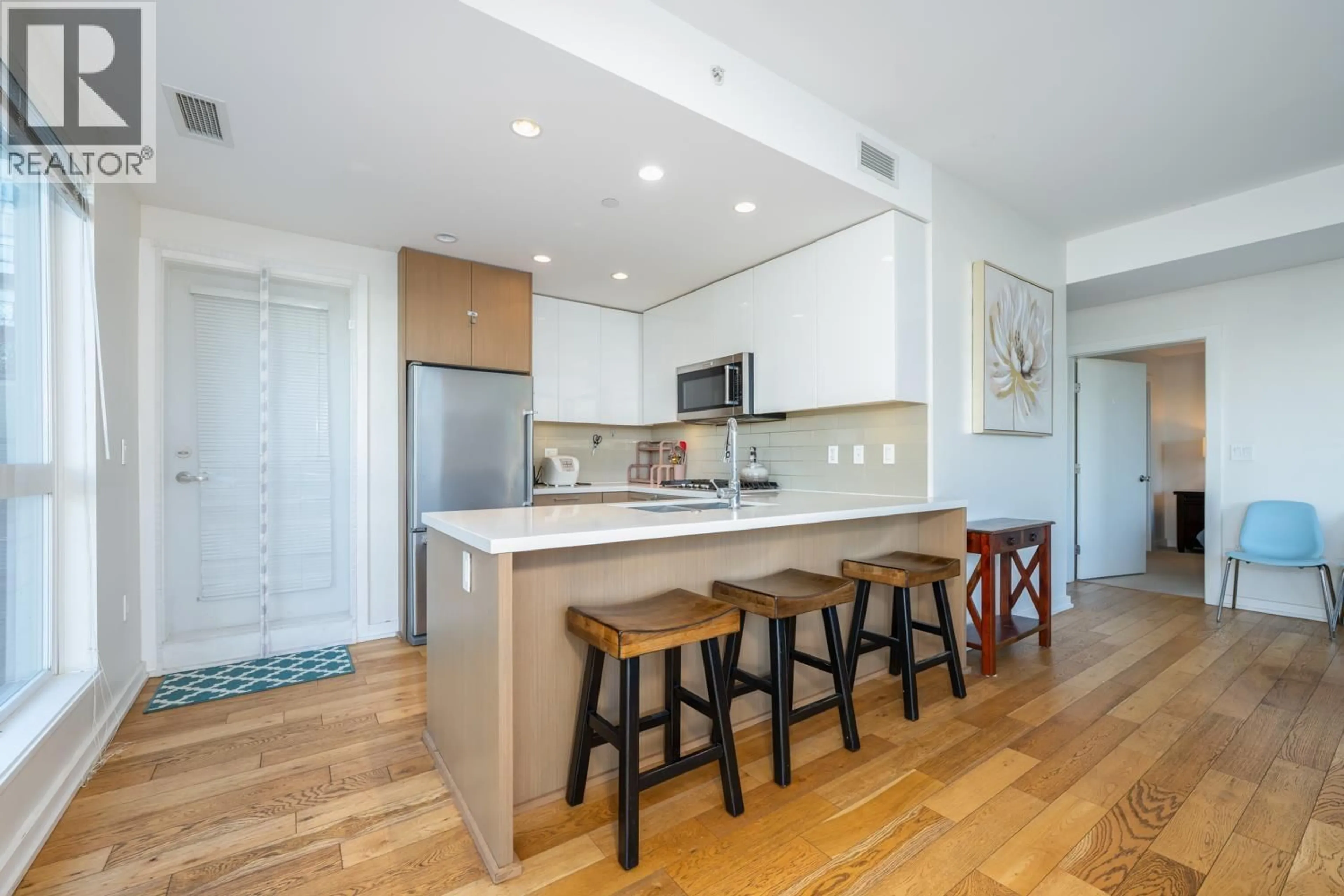 Open concept kitchen, unknown for 127 - 5311 CEDARBRIDGE WAY, Richmond British Columbia V6X0M3