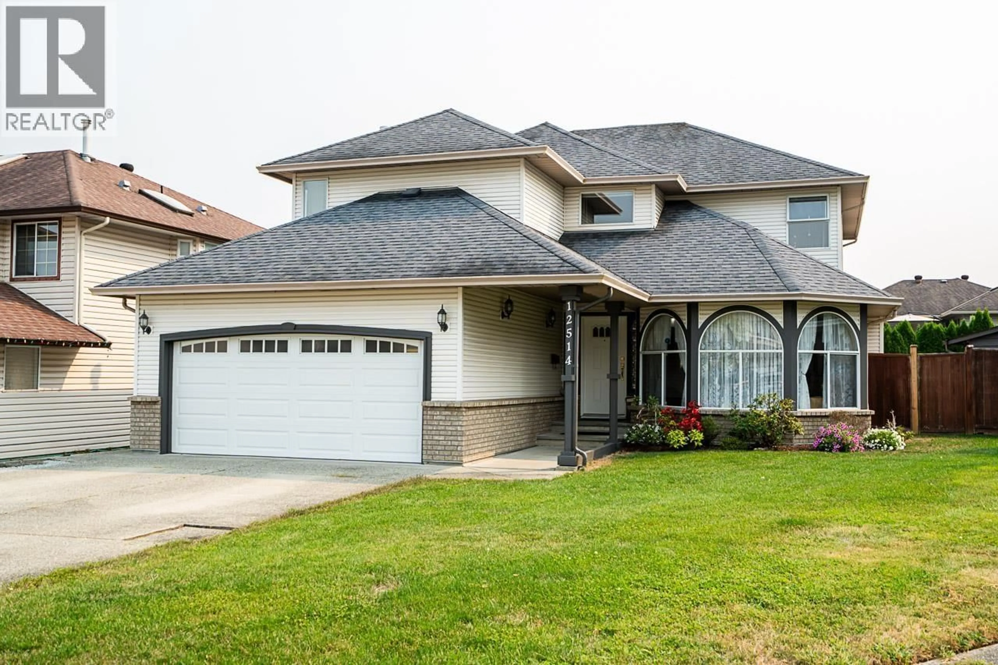 Home with vinyl exterior material, street for 12514 220 STREET, Maple Ridge British Columbia V2X0V6