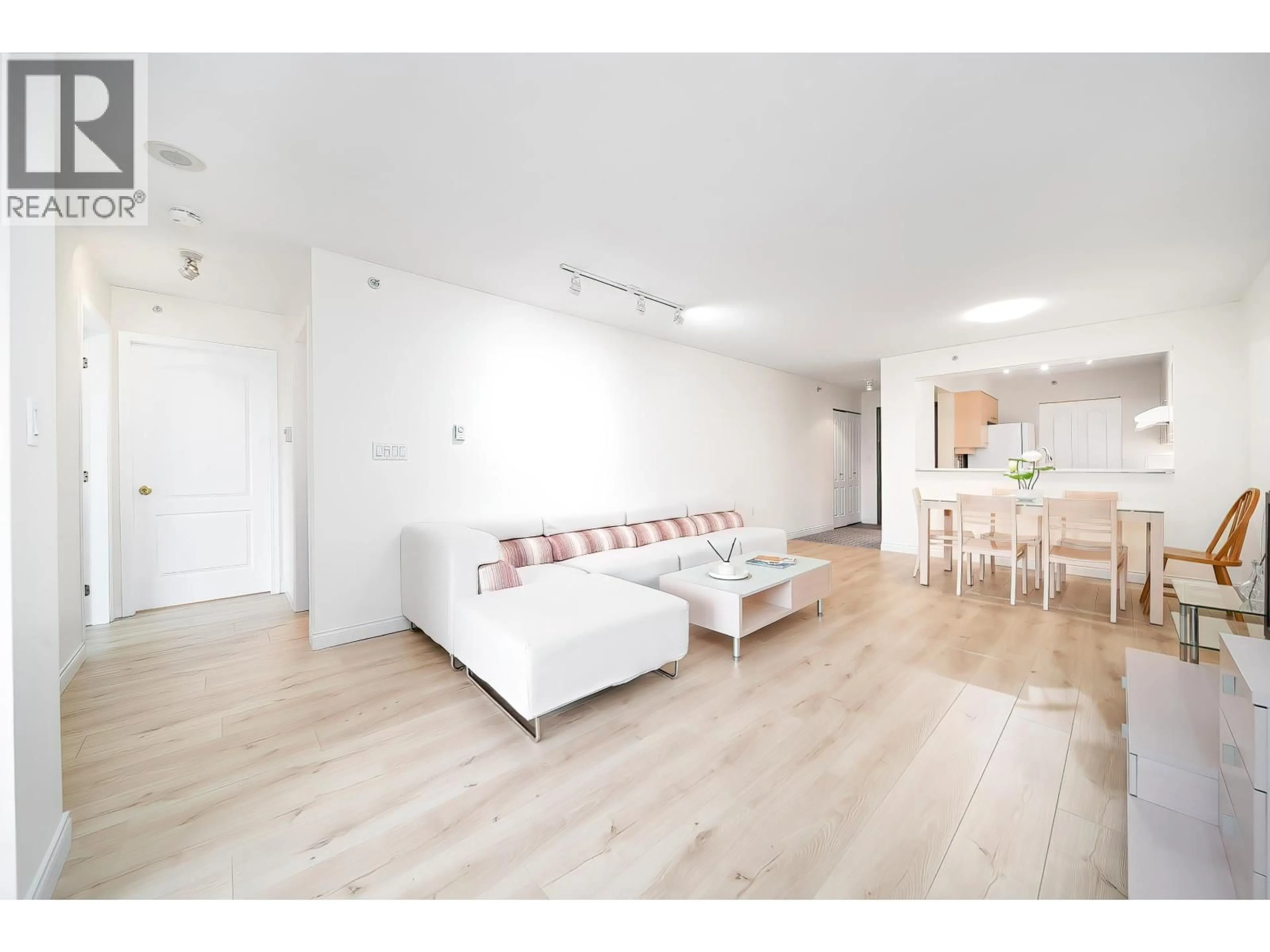 Living room with furniture, wood/laminate floor for 811 - 7380 ELMBRIDGE WAY, Richmond British Columbia V6X4A1