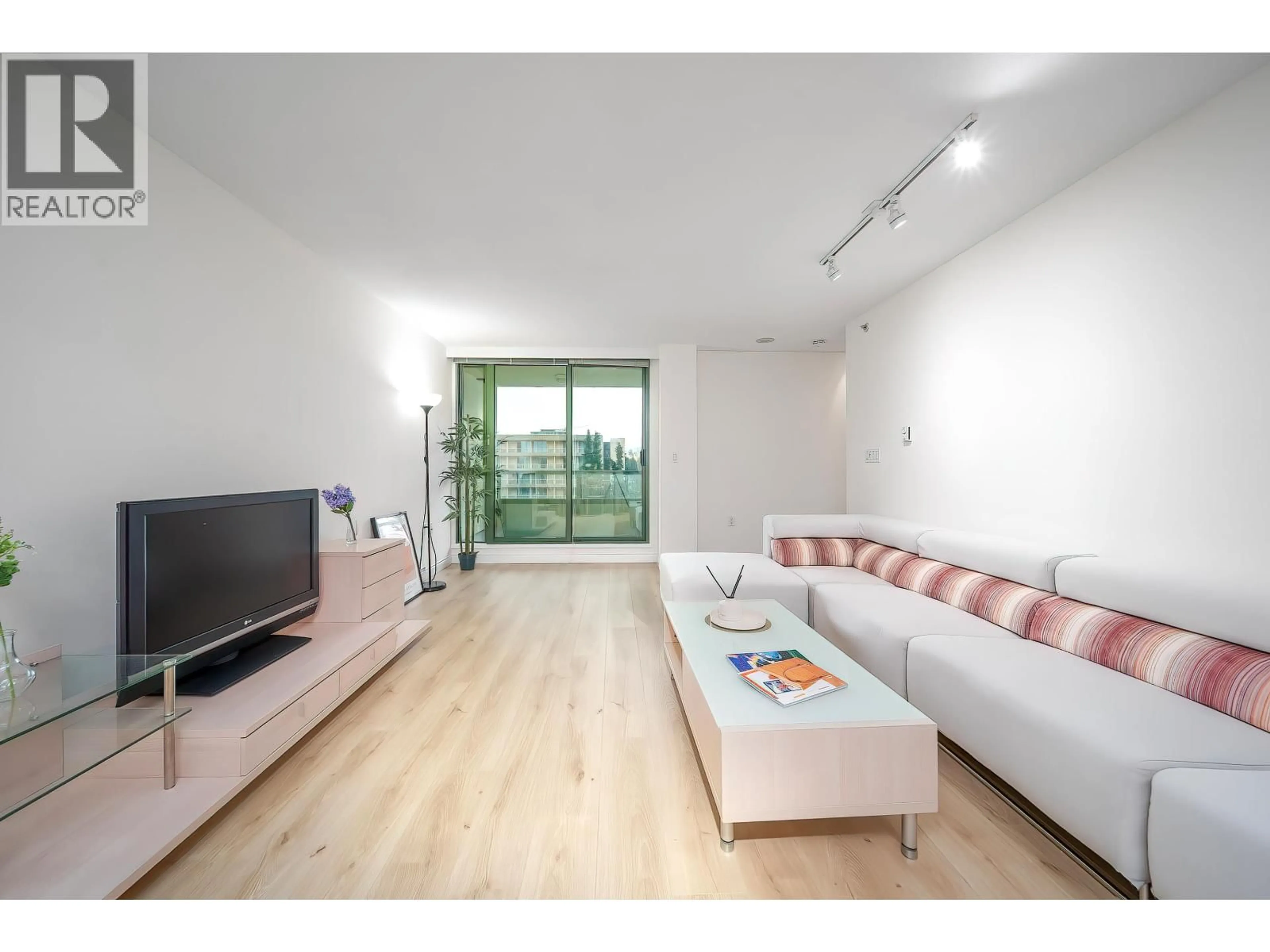 Living room with furniture, wood/laminate floor for 811 - 7380 ELMBRIDGE WAY, Richmond British Columbia V6X4A1