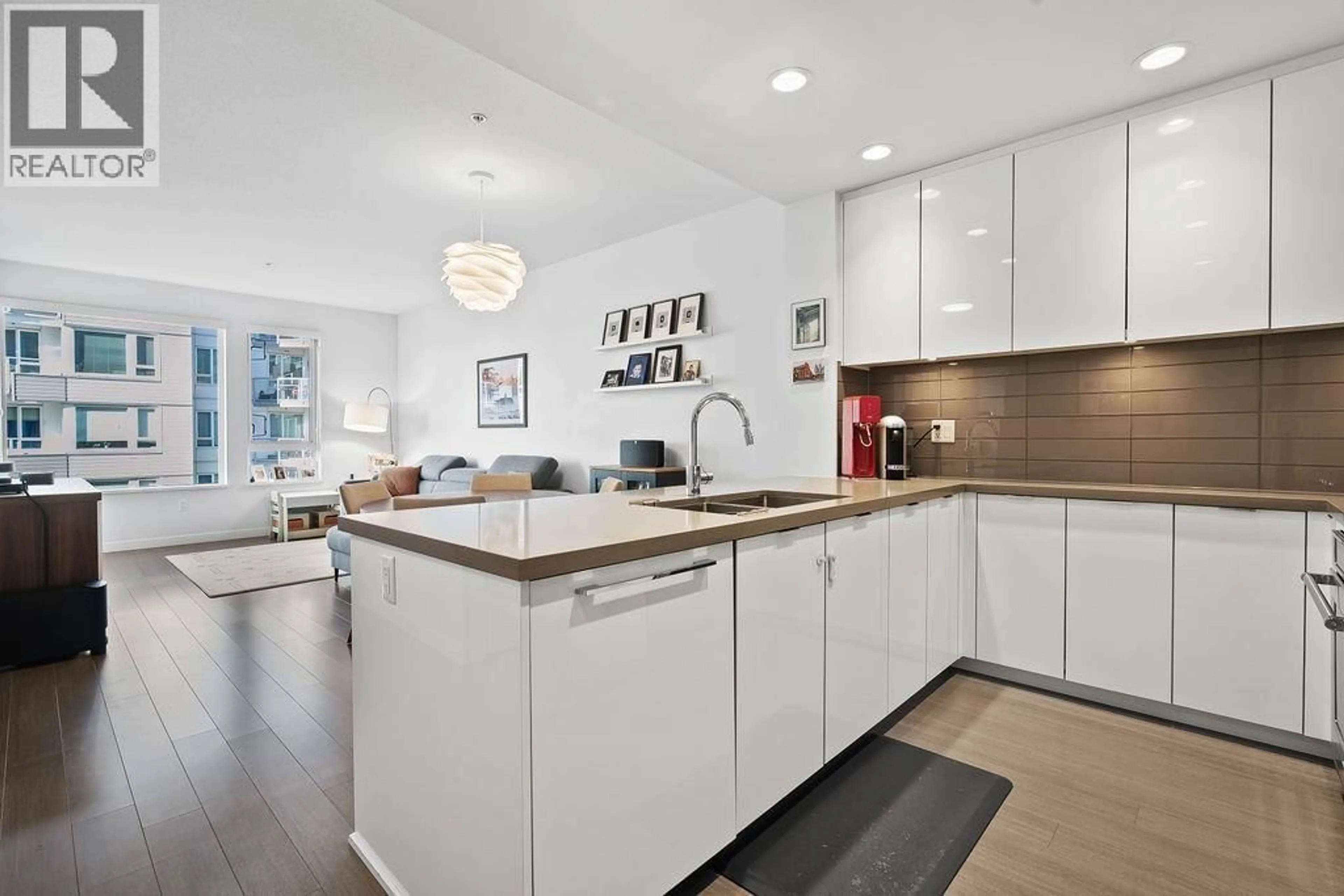 Open concept kitchen, unknown for 328 - 255 1ST STREET, North Vancouver British Columbia V7M3G8