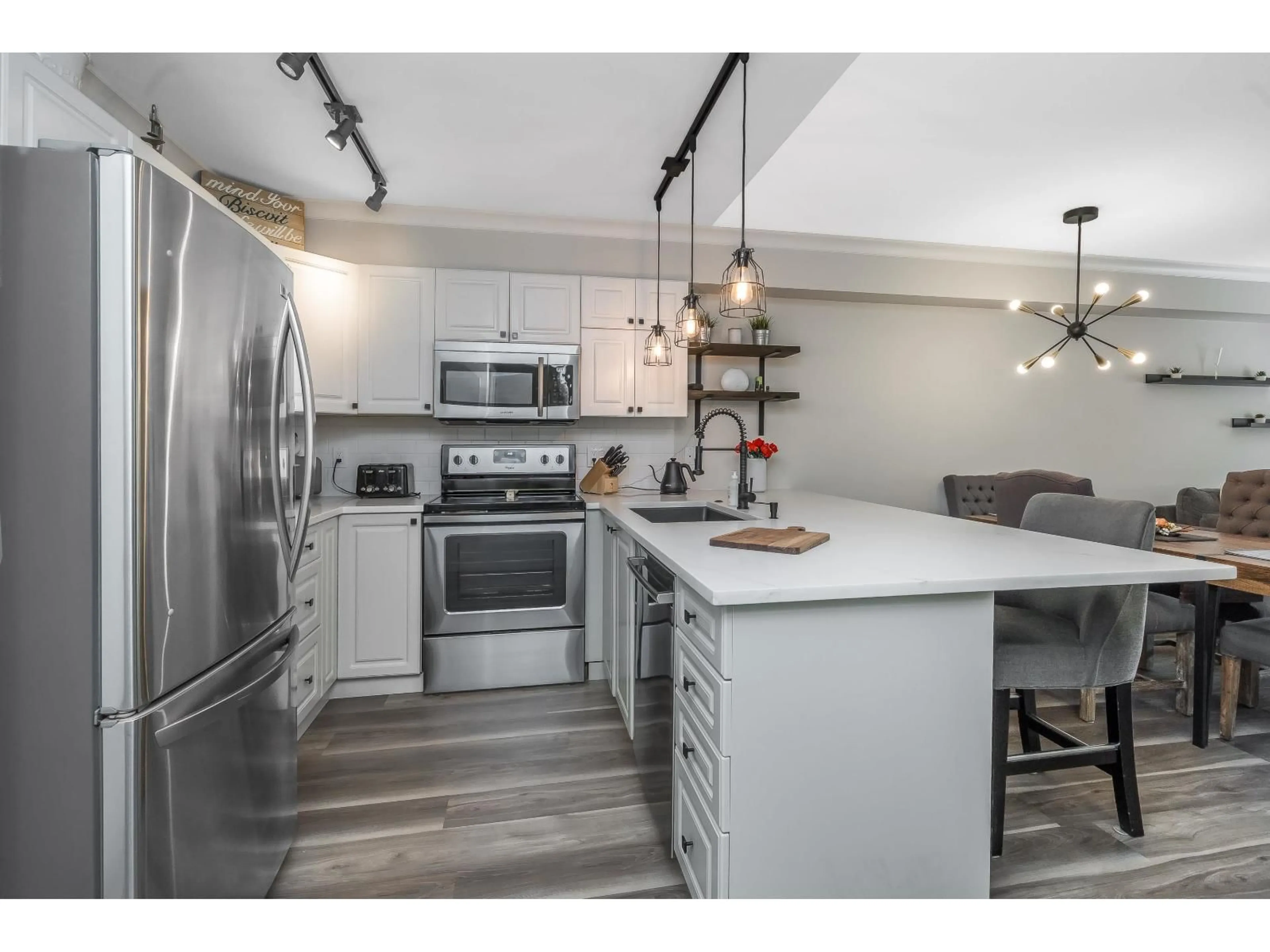Open concept kitchen, unknown for 101 - 20896 57 AVENUE, Langley British Columbia V3A8S9