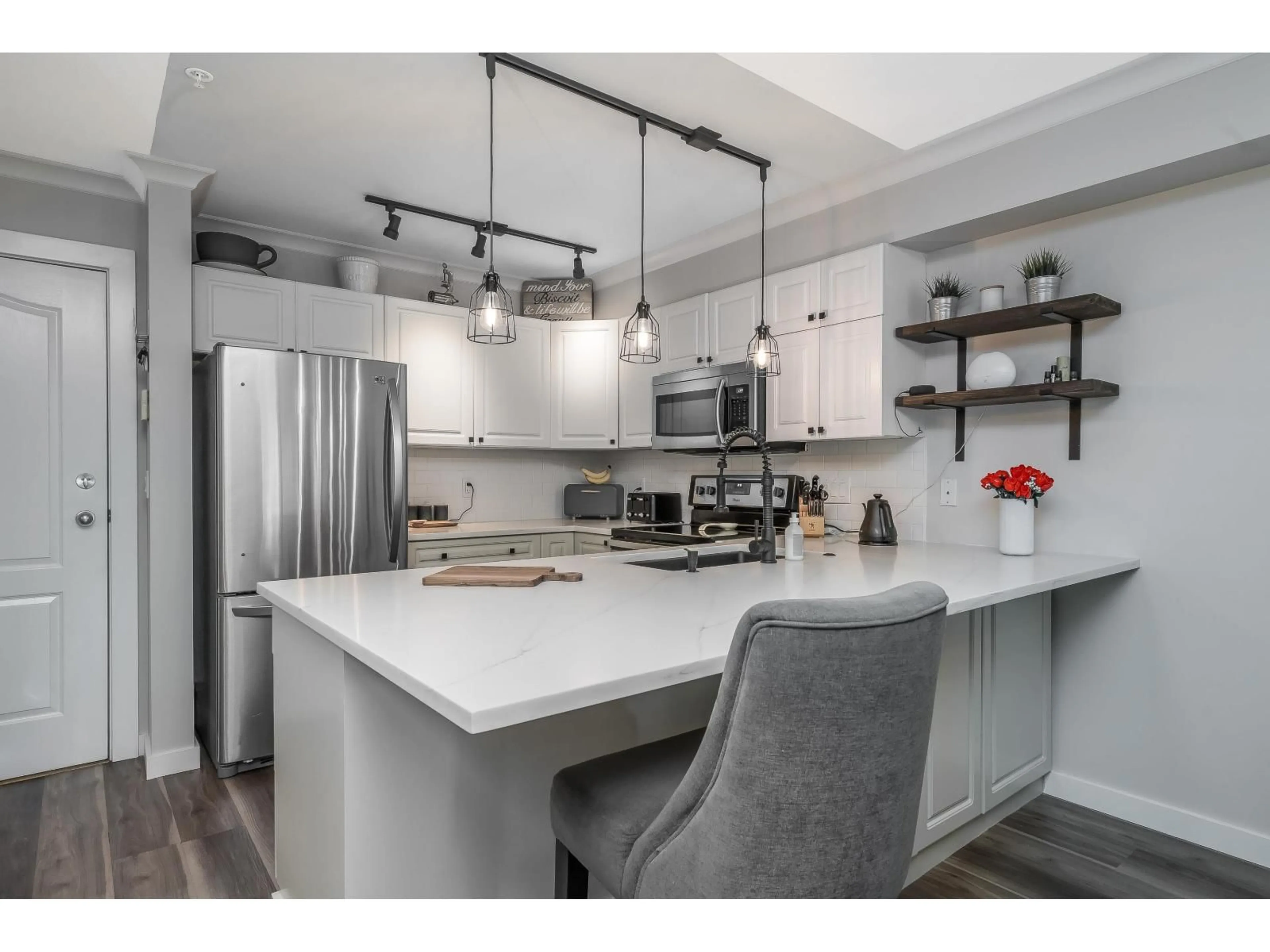 Open concept kitchen, unknown for 101 - 20896 57 AVENUE, Langley British Columbia V3A8S9