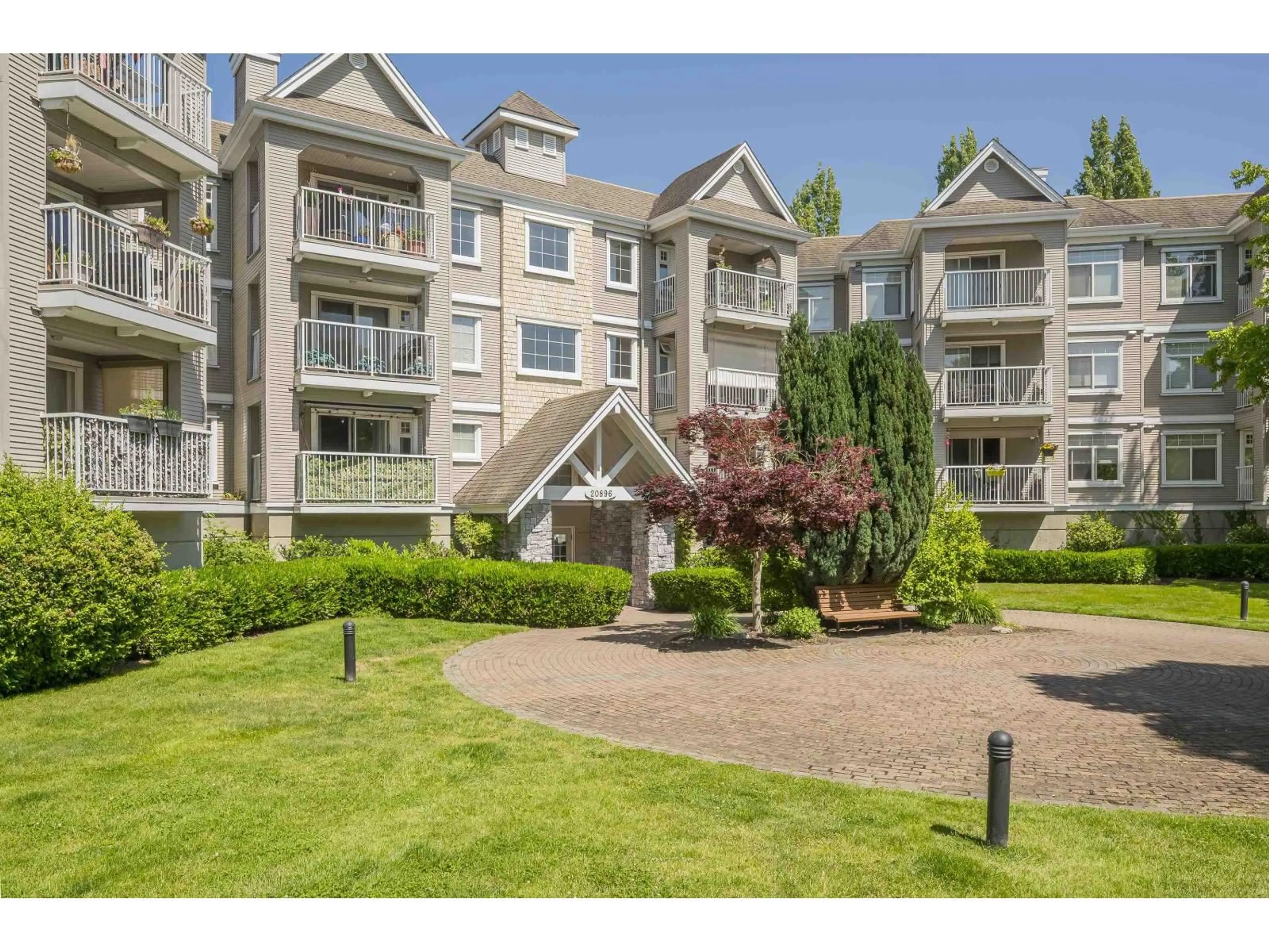 A pic from outside/outdoor area/front of a property/back of a property/a pic from drone, mountain view for 101 - 20896 57 AVENUE, Langley British Columbia V3A8S9