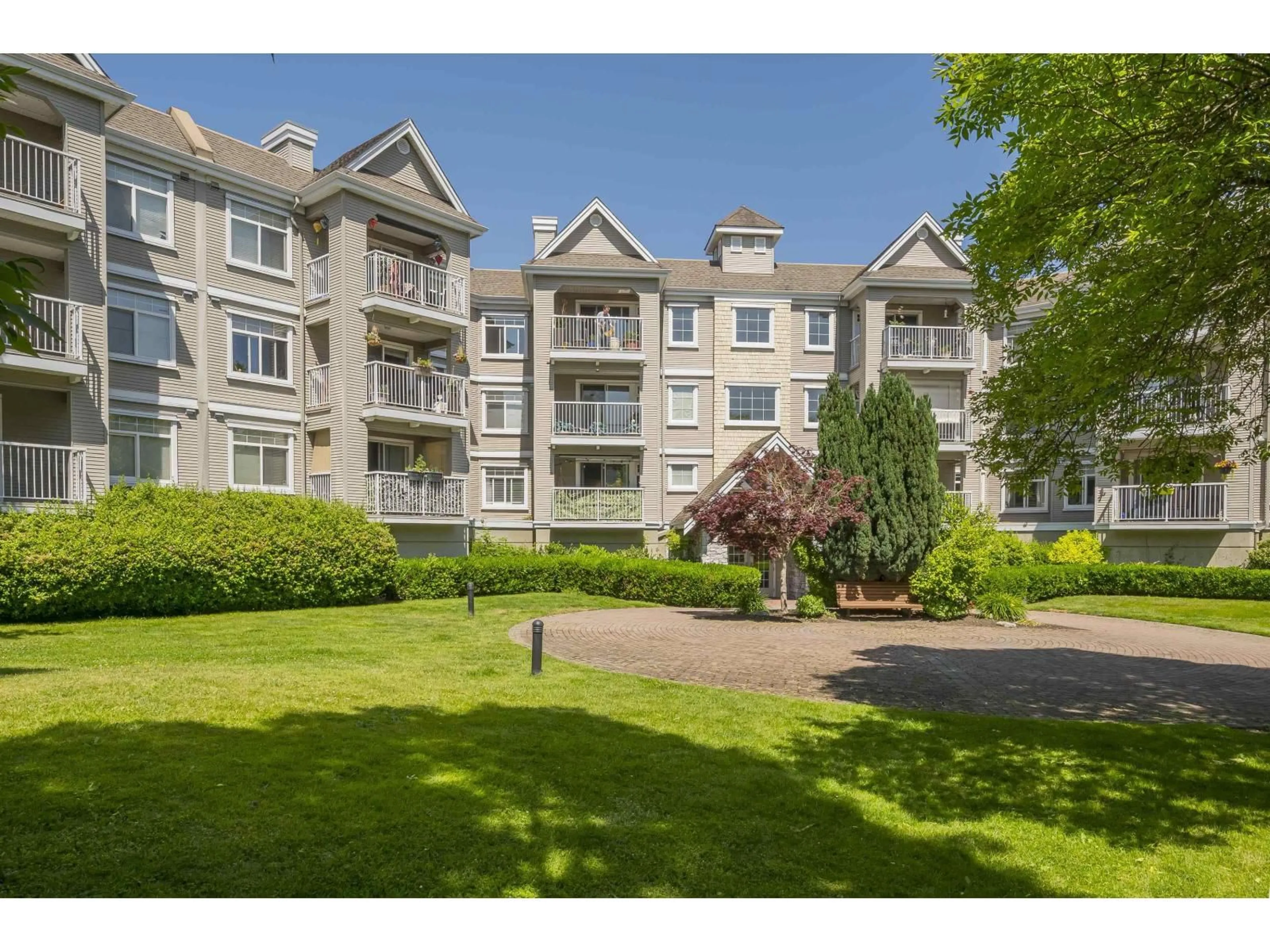 A pic from outside/outdoor area/front of a property/back of a property/a pic from drone, mountain view for 101 - 20896 57 AVENUE, Langley British Columbia V3A8S9