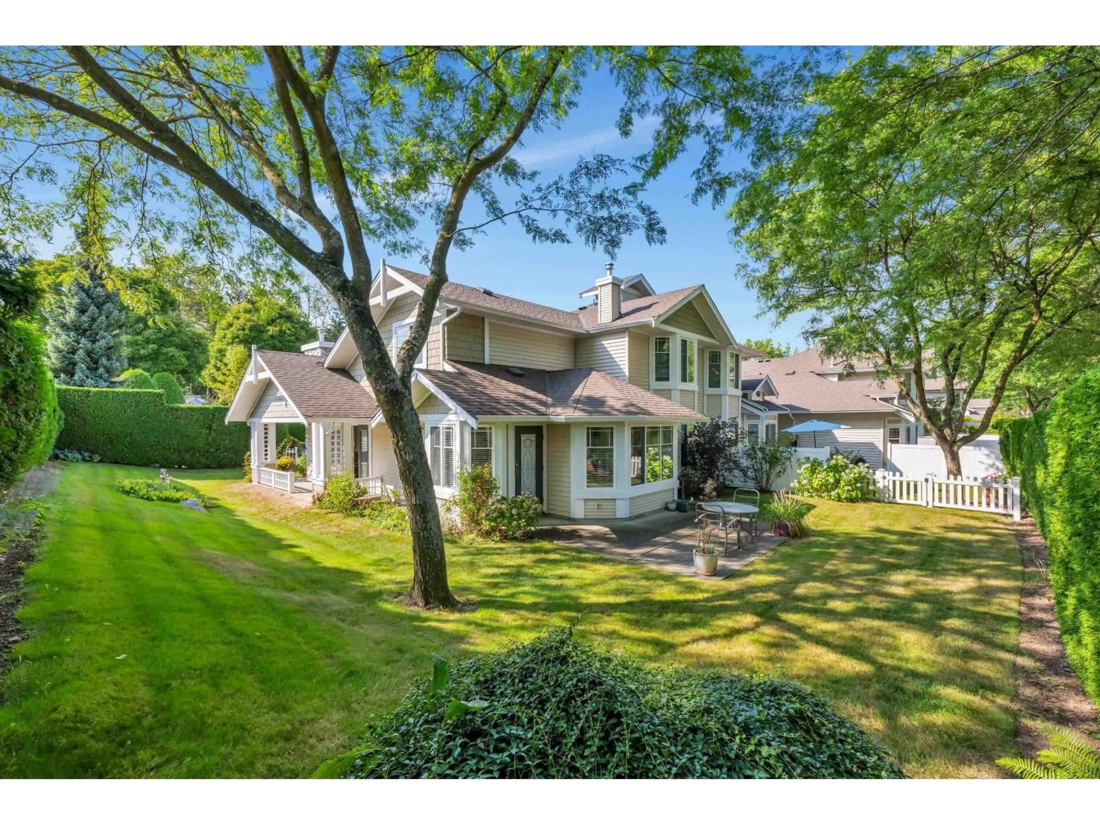 A pic from outside/outdoor area/front of a property/back of a property/a pic from drone, street for 7 - 6488 168 STREET, Surrey British Columbia V3S8Z1