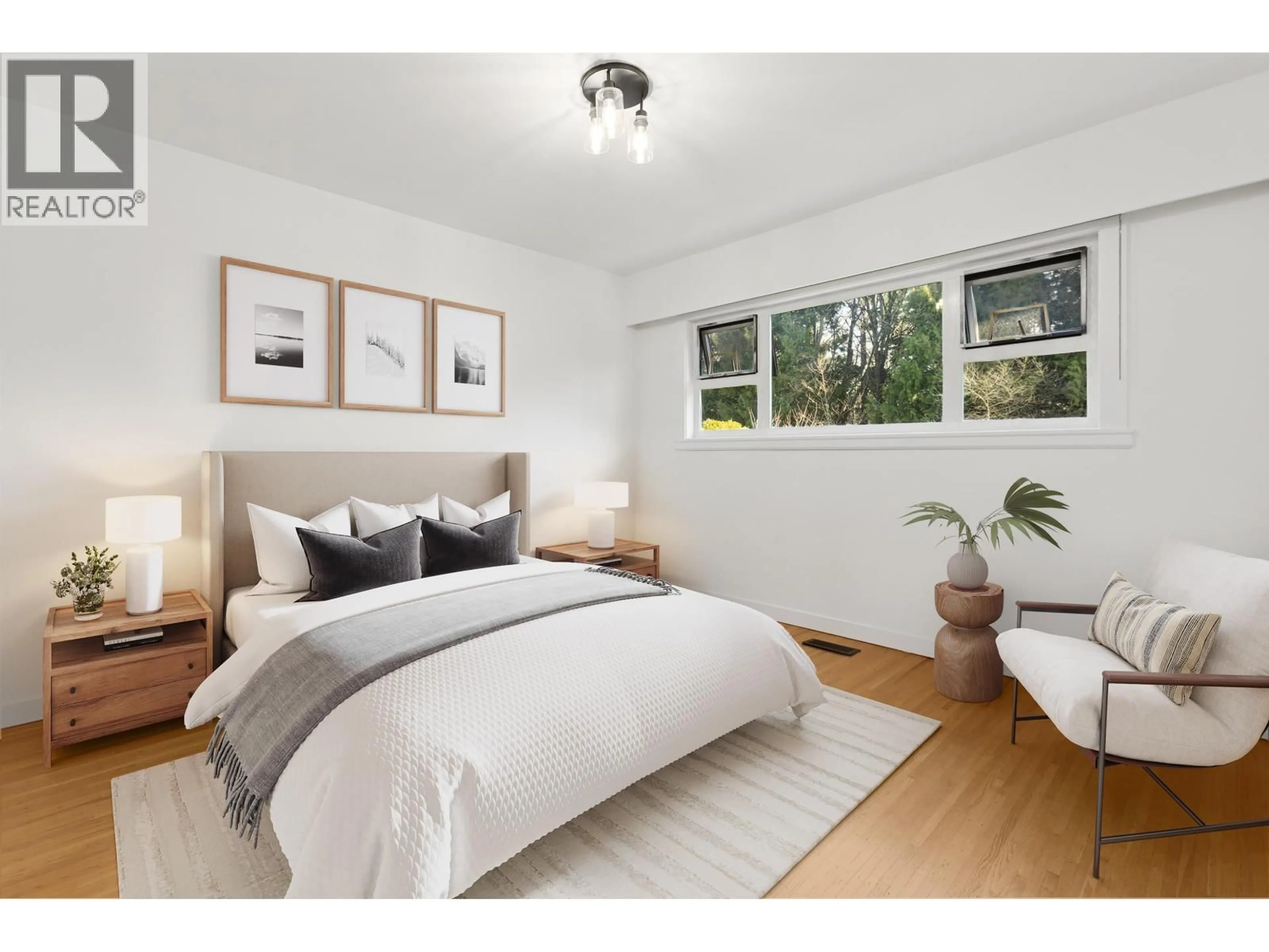 Bedroom with bed, wood/laminate floor for 7477 VIVIAN DRIVE, Vancouver British Columbia V5S2V5