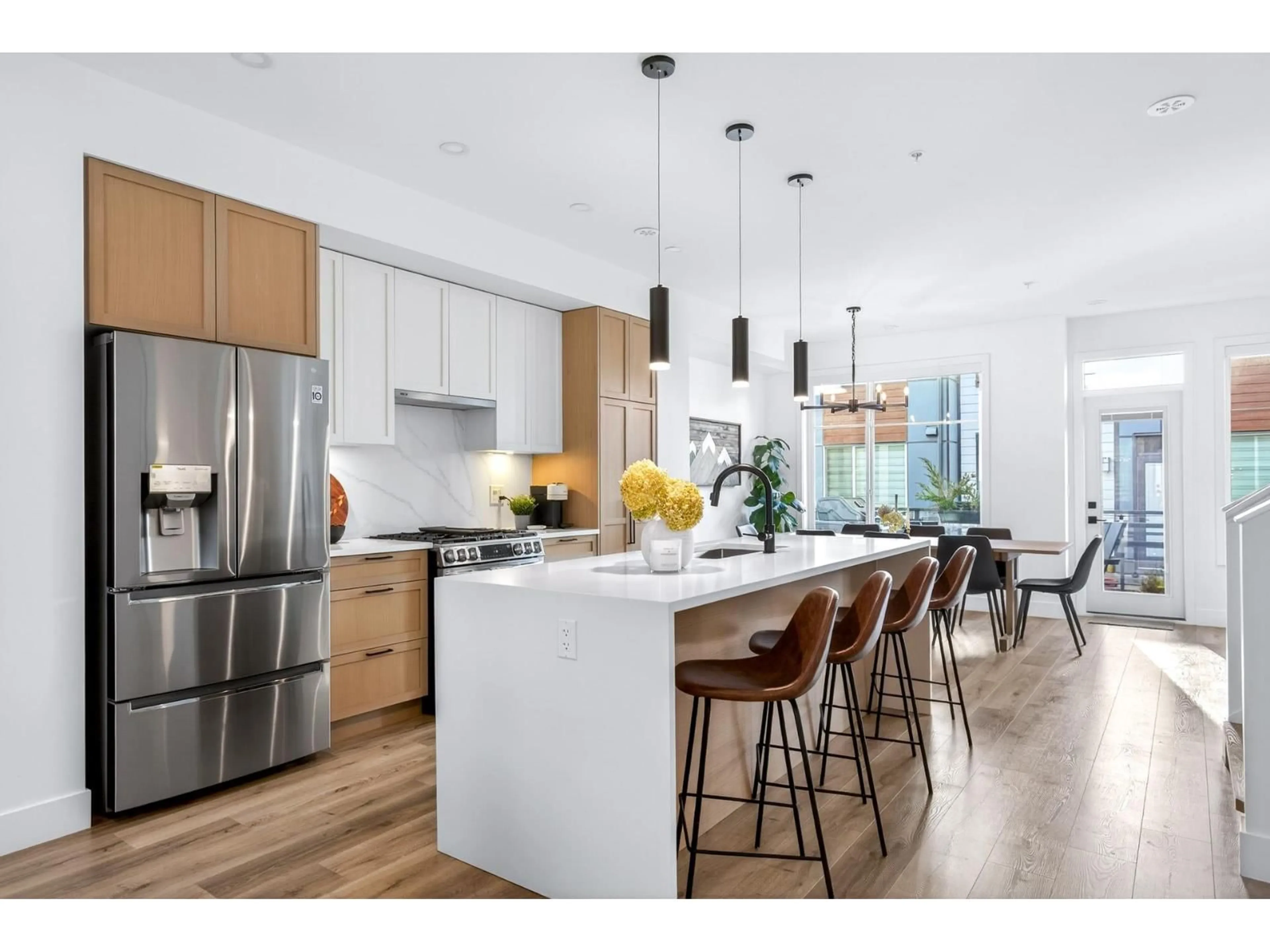 Open concept kitchen, wood/laminate floor for 73 - 20763 76 AVENUE, Langley British Columbia V2Y3N8