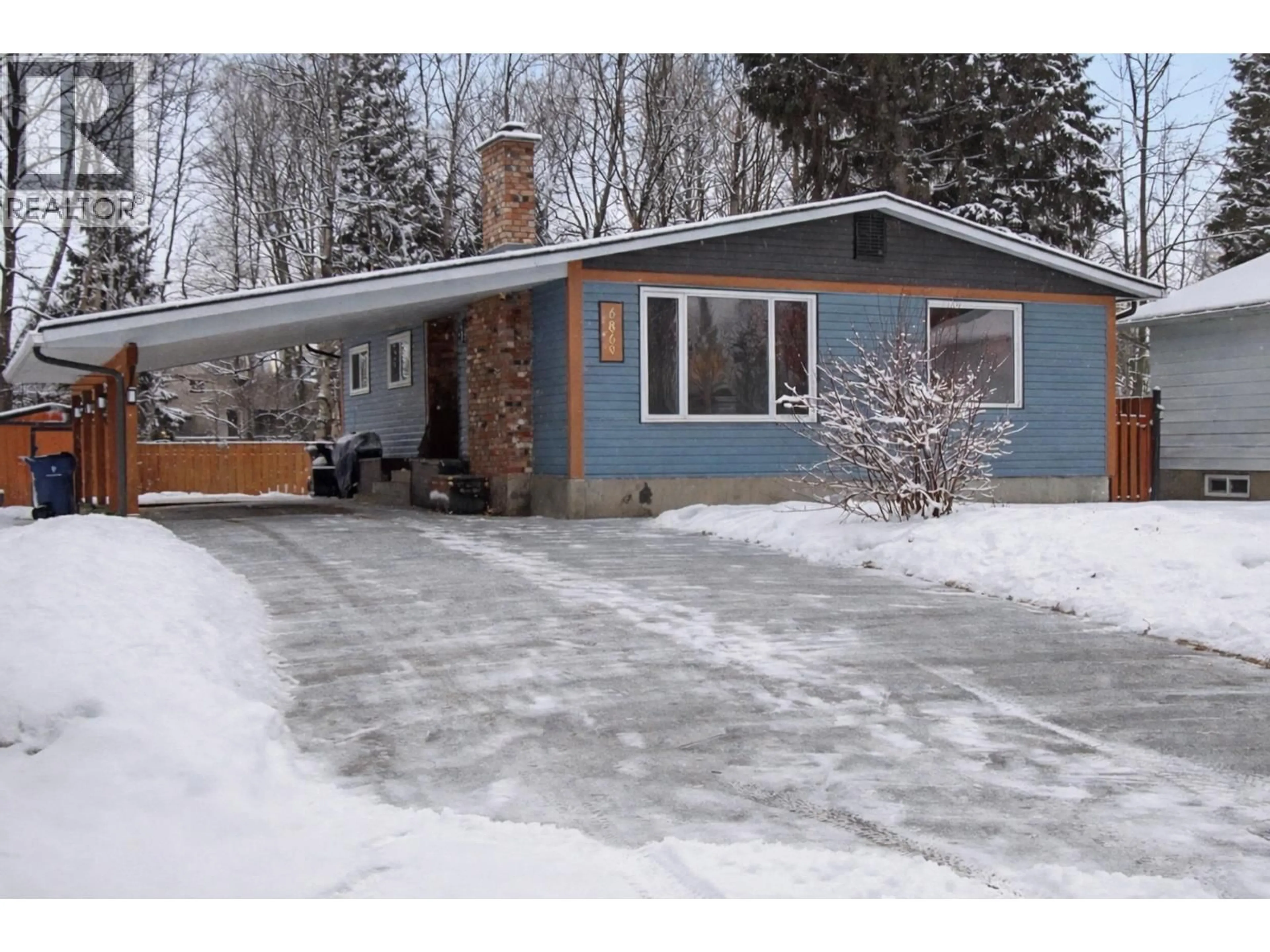 Home with vinyl exterior material, street for 6869 FAIRMONT CRESCENT, Prince George British Columbia V2N2P7